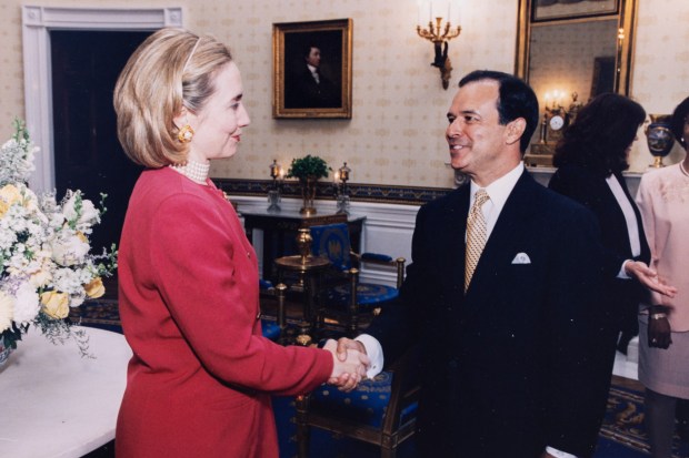 Raul R. Tapia, shown here with Hillary Clinton, earned a law degree and a master's degree in public administration from Harvard and served asdeputy assistant to the president for Hispanic affairs under Jimmy Carter. (Photo courtesy of Raul R. Tapia)
