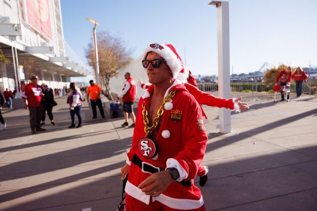 San Francisco 49ers fans dress as Santa before the 49ers play the Bears at Levi's Stadium on Sunday, Dec. 28, 2025, at Levi's Stadium in Santa Clara, Calif. (Armando L. Sanchez/Chicago Tribune)