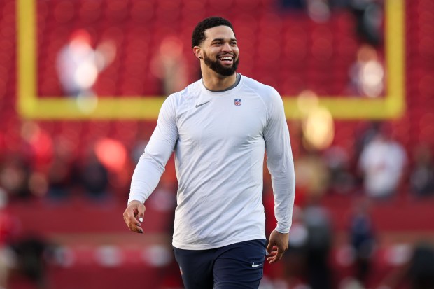 Bears quarterback Caleb Williams walks on the field while warming up before playing the 49ers on Sunday, Dec. 28, 2025, at Levi's Stadium in Santa Clara, Calif. (Armando L. Sanchez/Chicago Tribune)