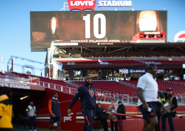 Bears defensive end Montez Sweat, center, enters the field to warm up for a game against the 49ers on Sunday, Dec. 28, 2025, at Levi's Stadium in Santa Clara, Calif. (John J. Kim/Chicago Tribune)