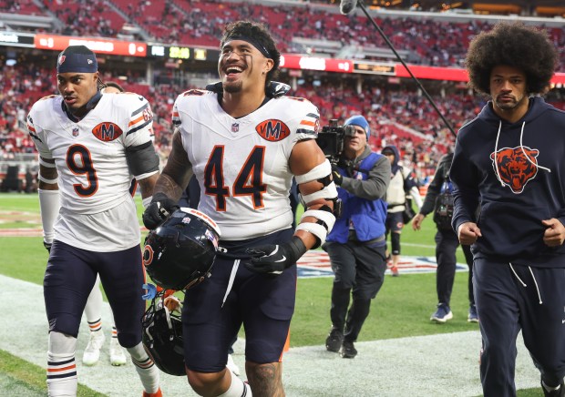 Bears safety Jaquan Brisker (9), linebacker Noah Sewell (44) and wide receiver Rome Odunze head to the locker room before a game against the 49ers on Sunday, Dec. 28, 2025, at Levi's Stadium in Santa Clara, Calif. (John J. Kim/Chicago Tribune)