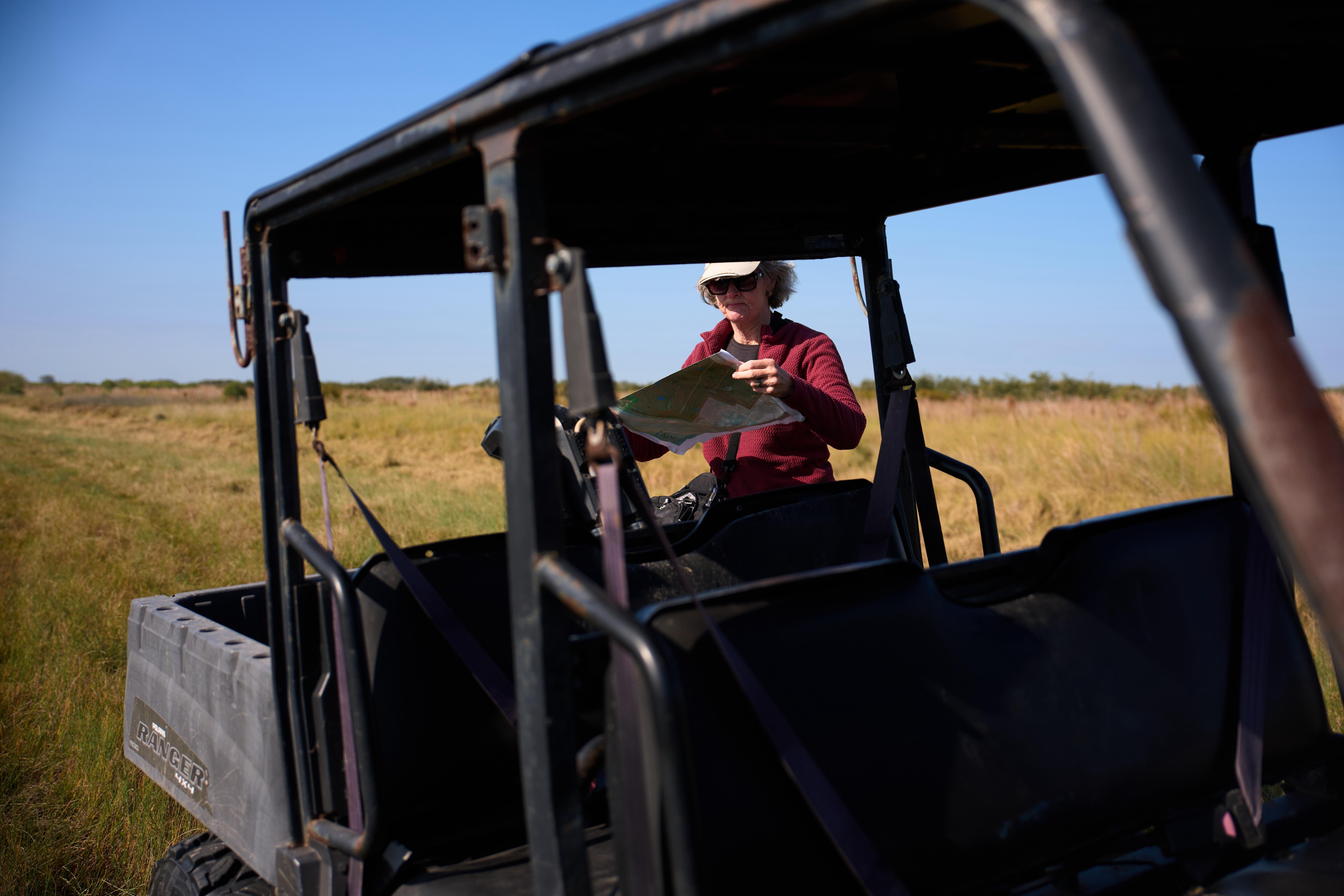 Julie Shackelford, Texas State Director at The Conservation Fund, unfurls...