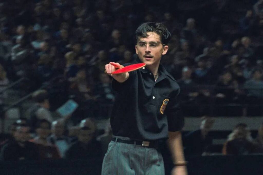 A still of Timothée Chalamet in Marty Supreme. Catch Marty Supreme in 70mm in L.A ahead of its global release.