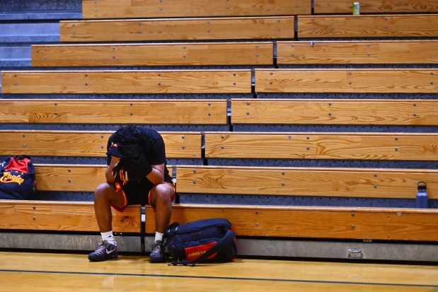 AIMS College Prep's Amr Aldhanebi (2) sits dejected after being defeated by King's Academy during the Damian Lillard Classic at Oakland High School in Oakland, Calif., on Friday, Dec. 26, 2025. King's Academy defeated AIMS 93-25. (Jose Carlos Fajardo/Bay Area News Group)
