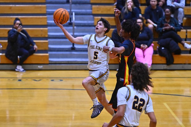 King's Academy's Micah Huang goes up for a layup against AIMS College Prep in the first period of their game during the Damian Lillard Classic at Oakland High School in Oakland, Calif., on Friday, Dec. 26, 2025. (Jose Carlos Fajardo/Bay Area News Group)