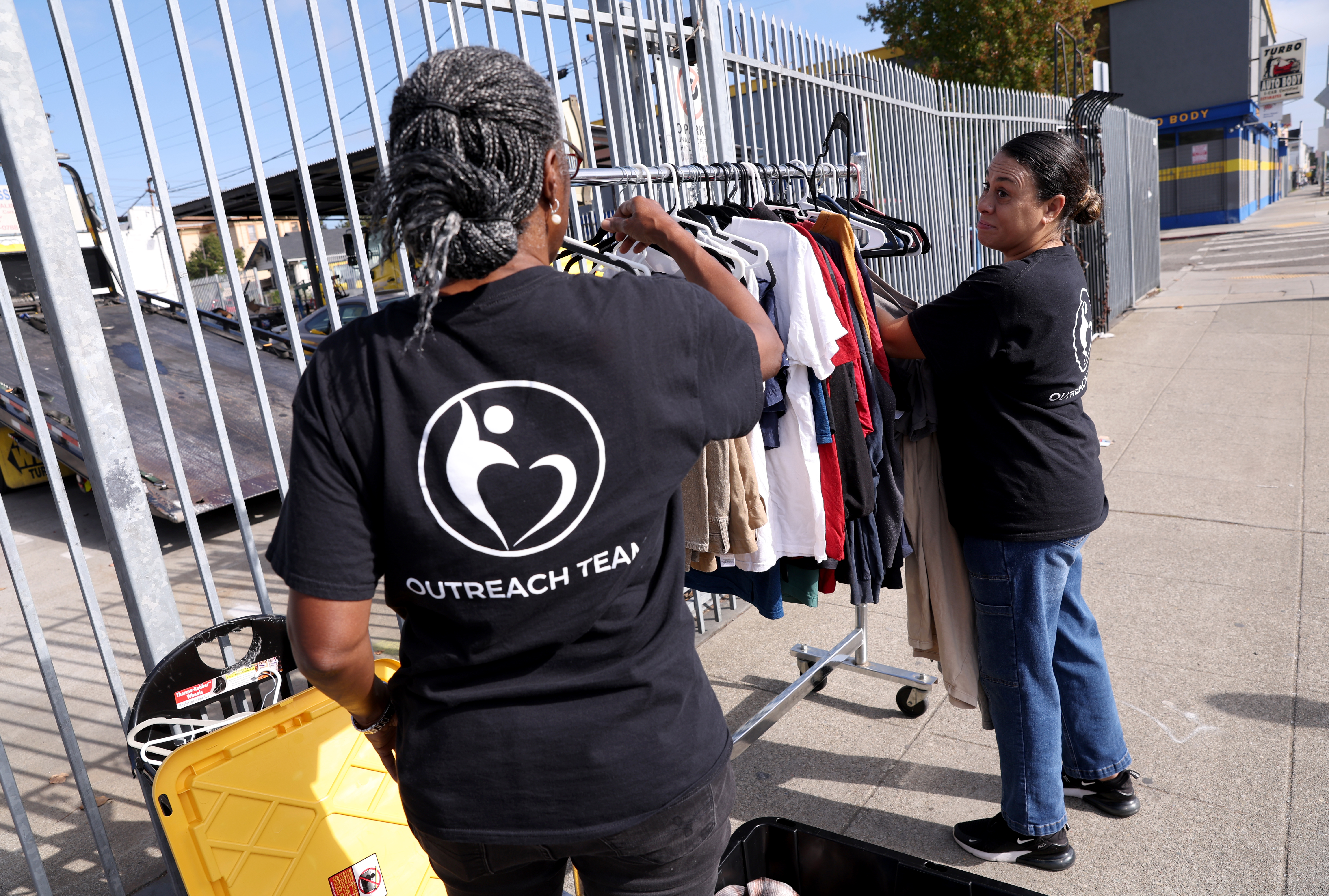 Love Never Fails staff members Leanette Guillory-Higuera and Valerie Brown,...