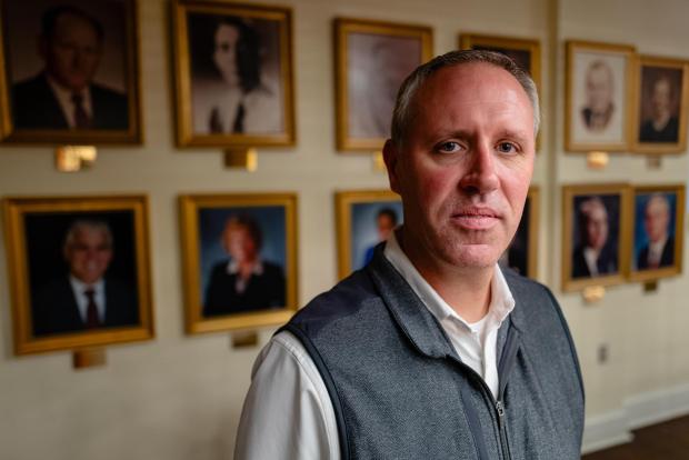 Superintendent Dr. Joshua Matthews sits for a portrait at the Shelby County Public Schools Central Office, Nov. 18, 2025, in Shelbyville, Ky. (AP Photo/Jon Cherry)