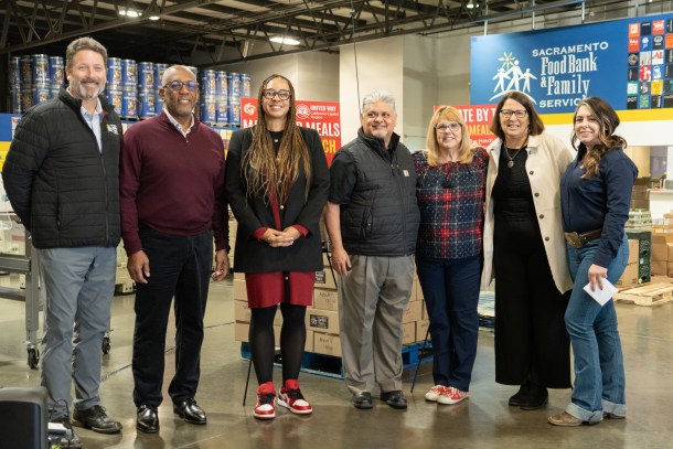 From left to right: Blake Young, executive director of Sacramento Food Bank and Family Services; Chet Hewitt, president and CEO of Sierra Health Foundation; Dr. Dawnte Early, president and CEO of United Way California Capital Region; Dave Martinez, executive director of Feeding the Foothills in Placer County; Beth Stanton, executive director of Interfaith Food Bank of Amador County; Karen Baker, executive director of Yolo Food Bank; and Makenzie Gold, administrative assistant of El Dorado County Food Bank. Sacramento Food Bank and Family Services on December 11, 2025. Roberta Alvarado, The OBSERVER