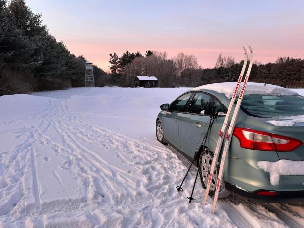 The sun rises over a winter scene in Lowville, N.Y.