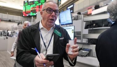 Wall Street climbs back to its all-time high