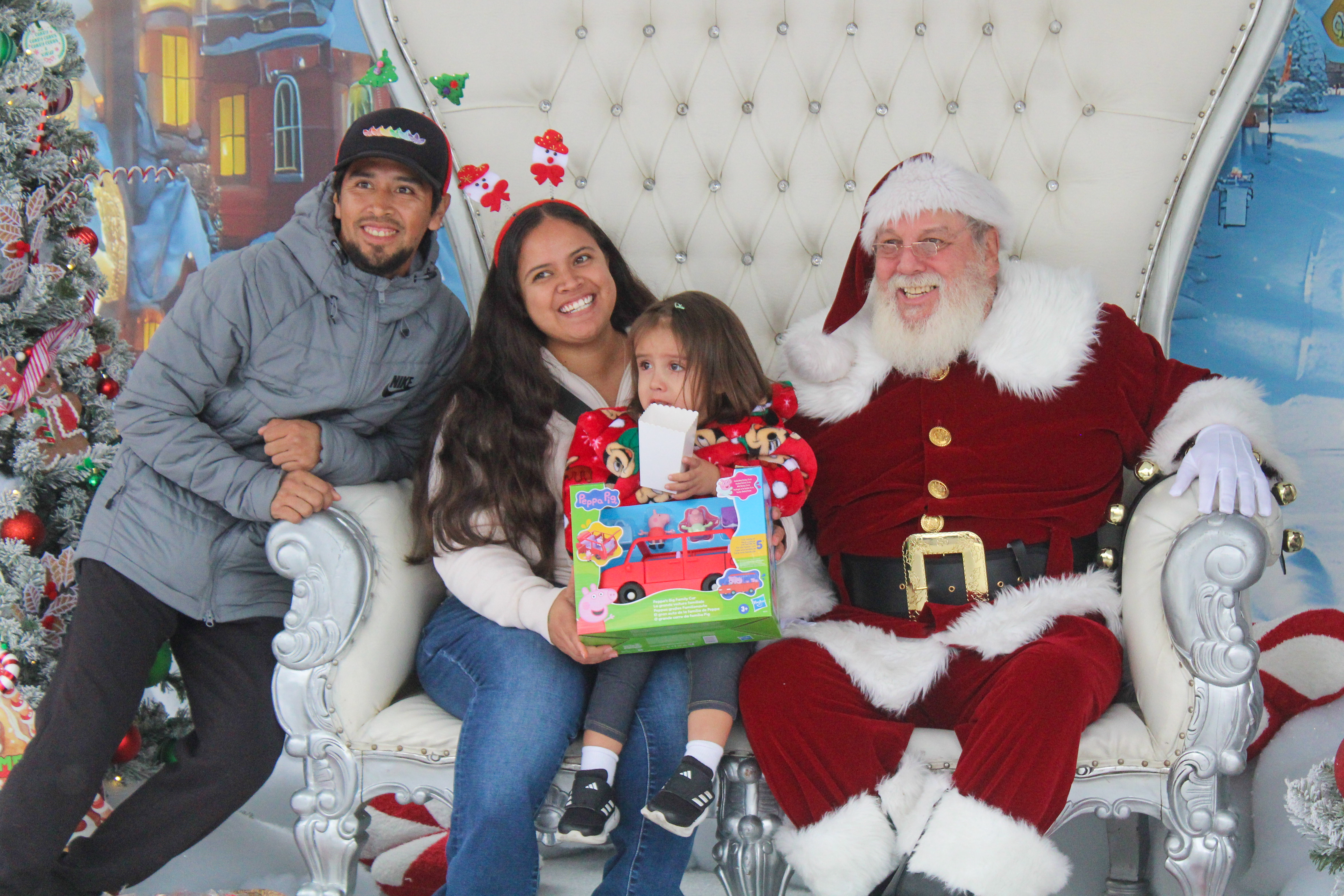 Hundreds of children and families posed for photos with Santa...