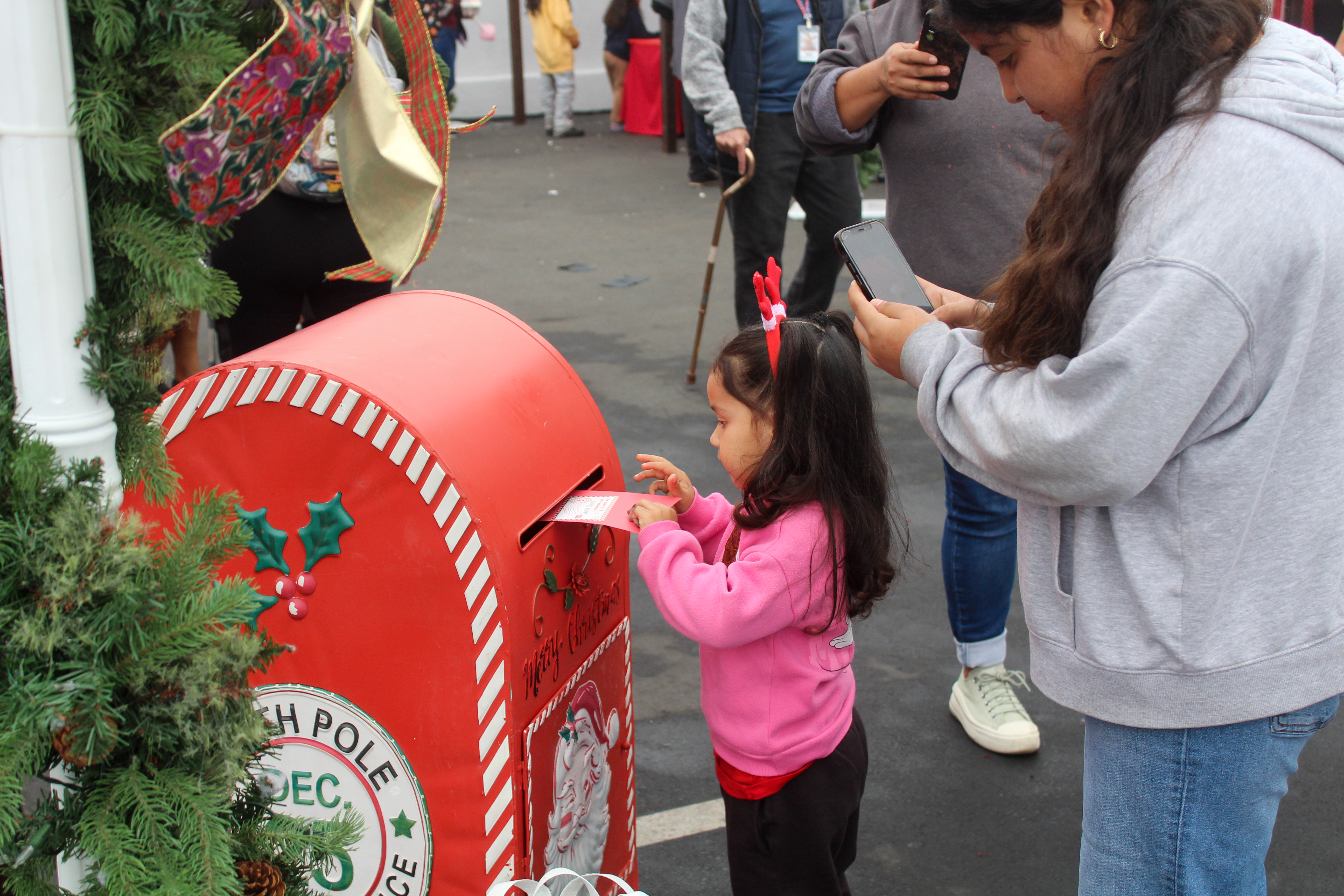 Children wrote letters to Santa Claus at the Long Beach...