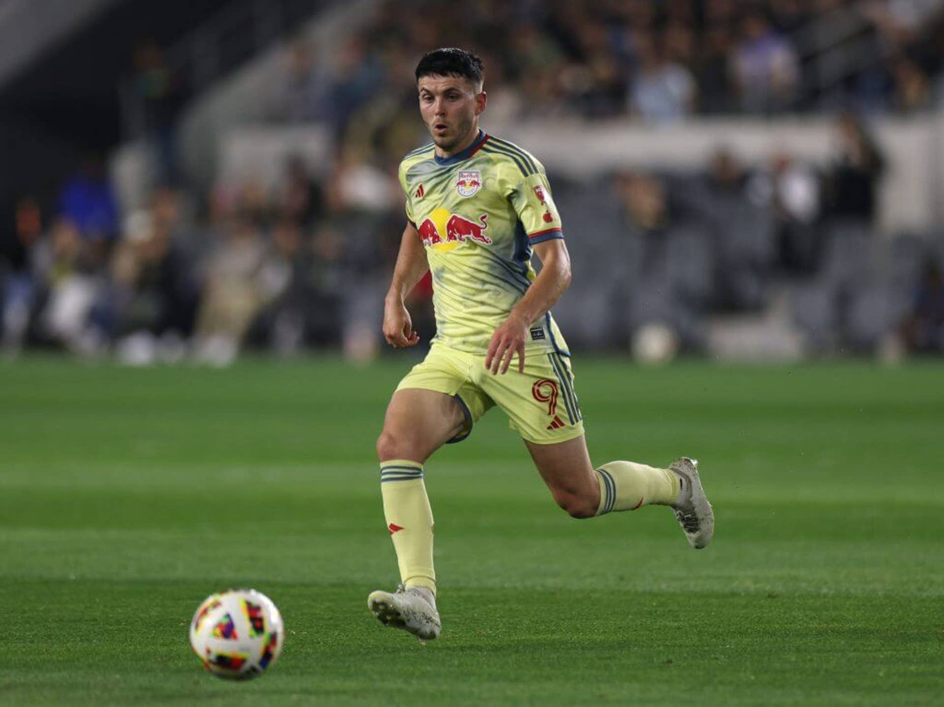 Lewis Morgan of New York Red Bulls chases a pass during a match against Los Angeles FC on April 20, 2024, in Los Angeles.