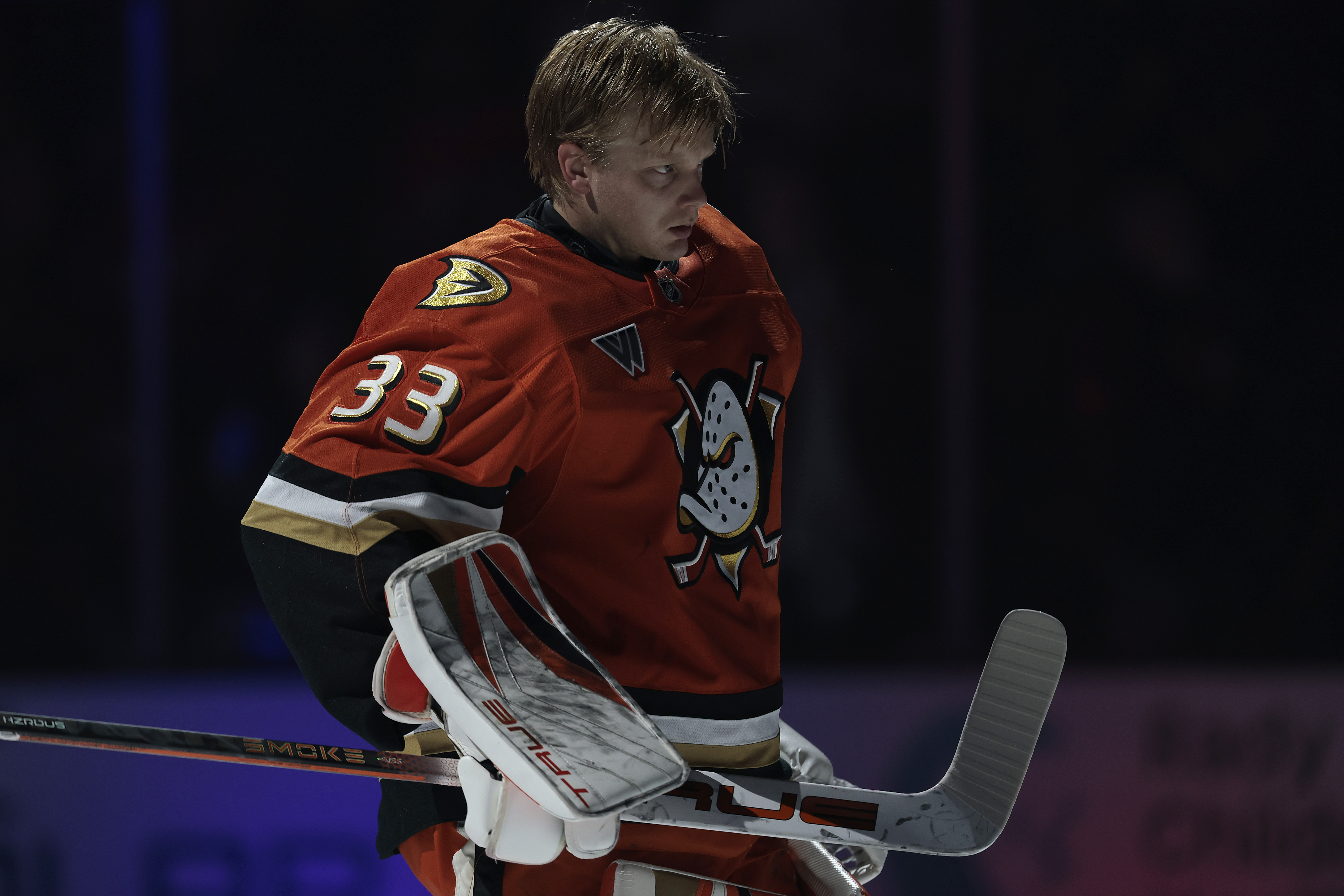 Ducks goaltender Ville Husso skates before a game against the...