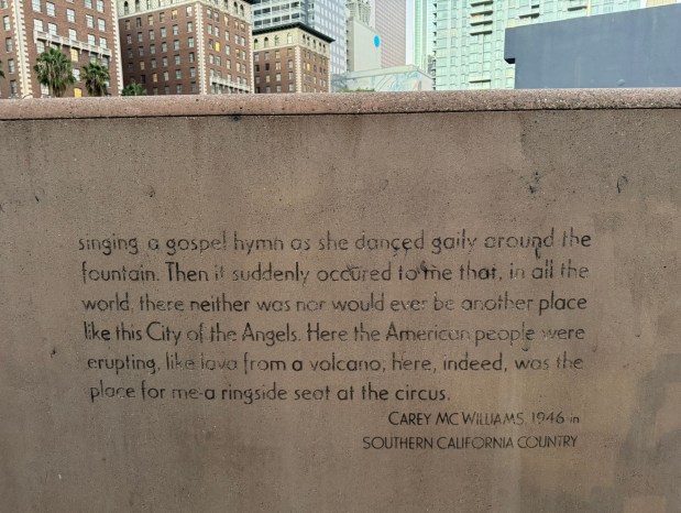 A six-panel monument in Pershing Square in downtown L.A. consists of nothing but a long quote about that very spot in the 1920s as observed by writer Carey McWilliams. (Photo by David Allen, Inland Valley Daily Bulletin/SCNG)