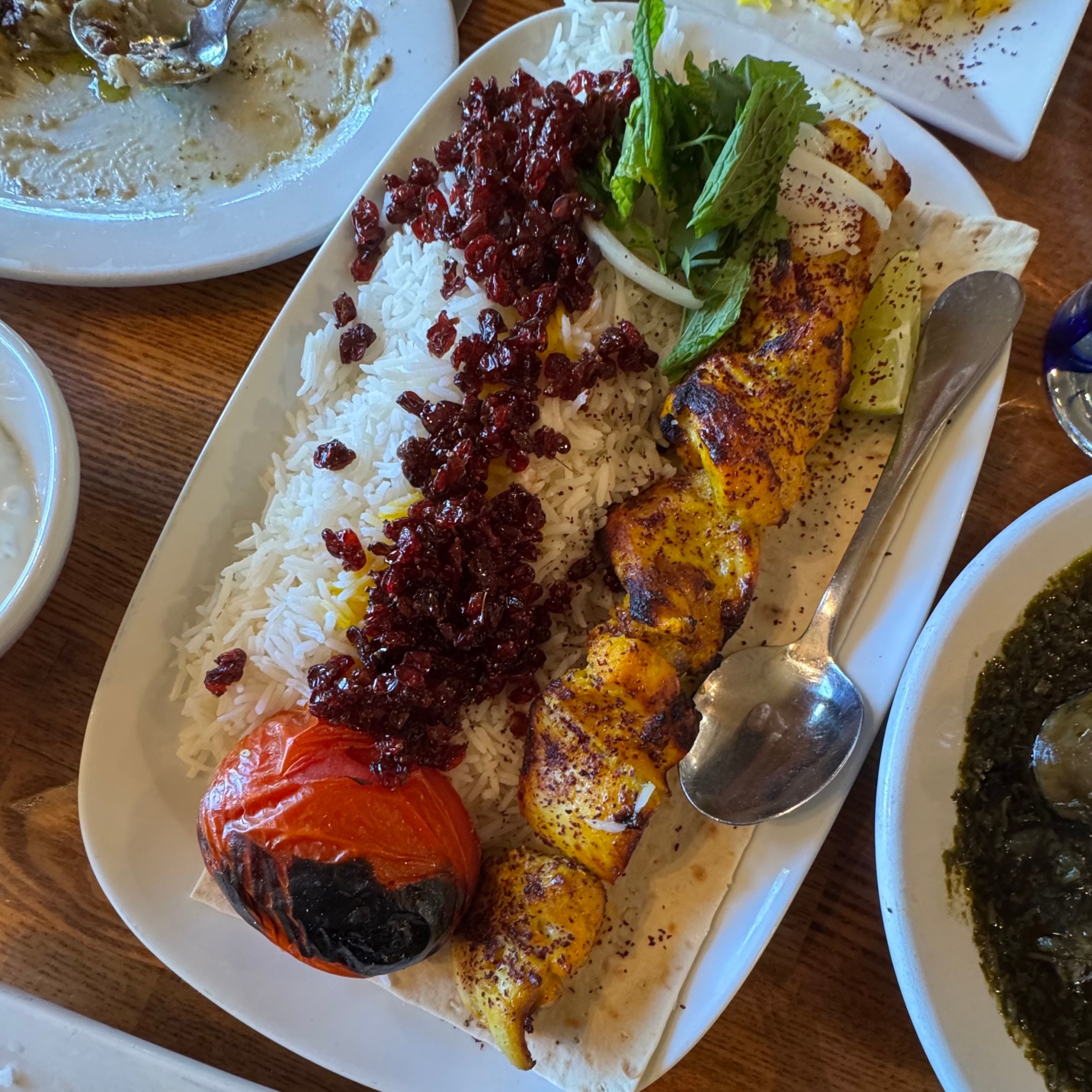 Joojeh kabob over basmati saffron rice with zereshk, or barberries, sprinkled over the rice at Lavash in San Francisco.