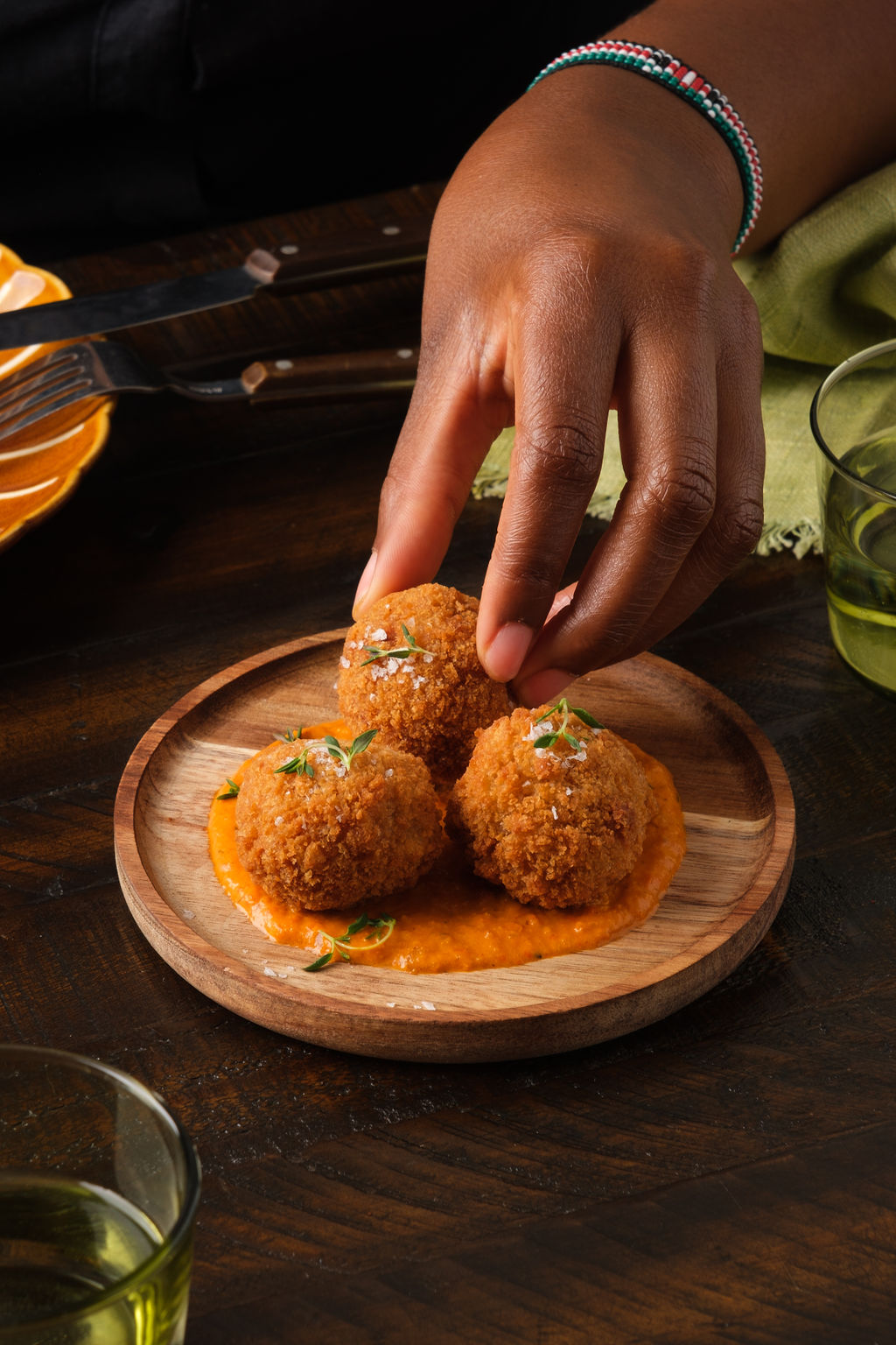 Jollof arancini at Jikoni