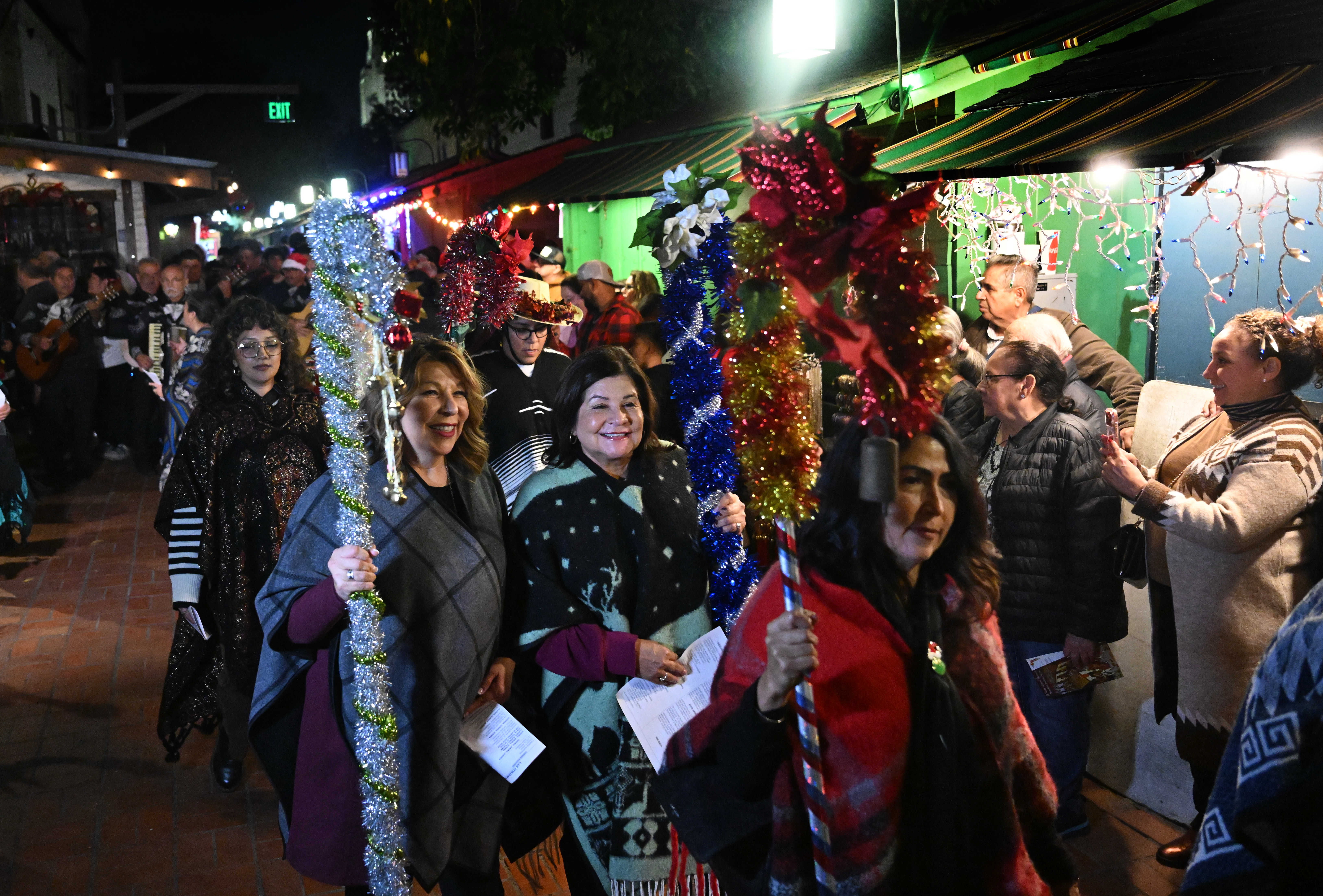 Las Posadas, reenacting the journey of Mary and Joseph to...
