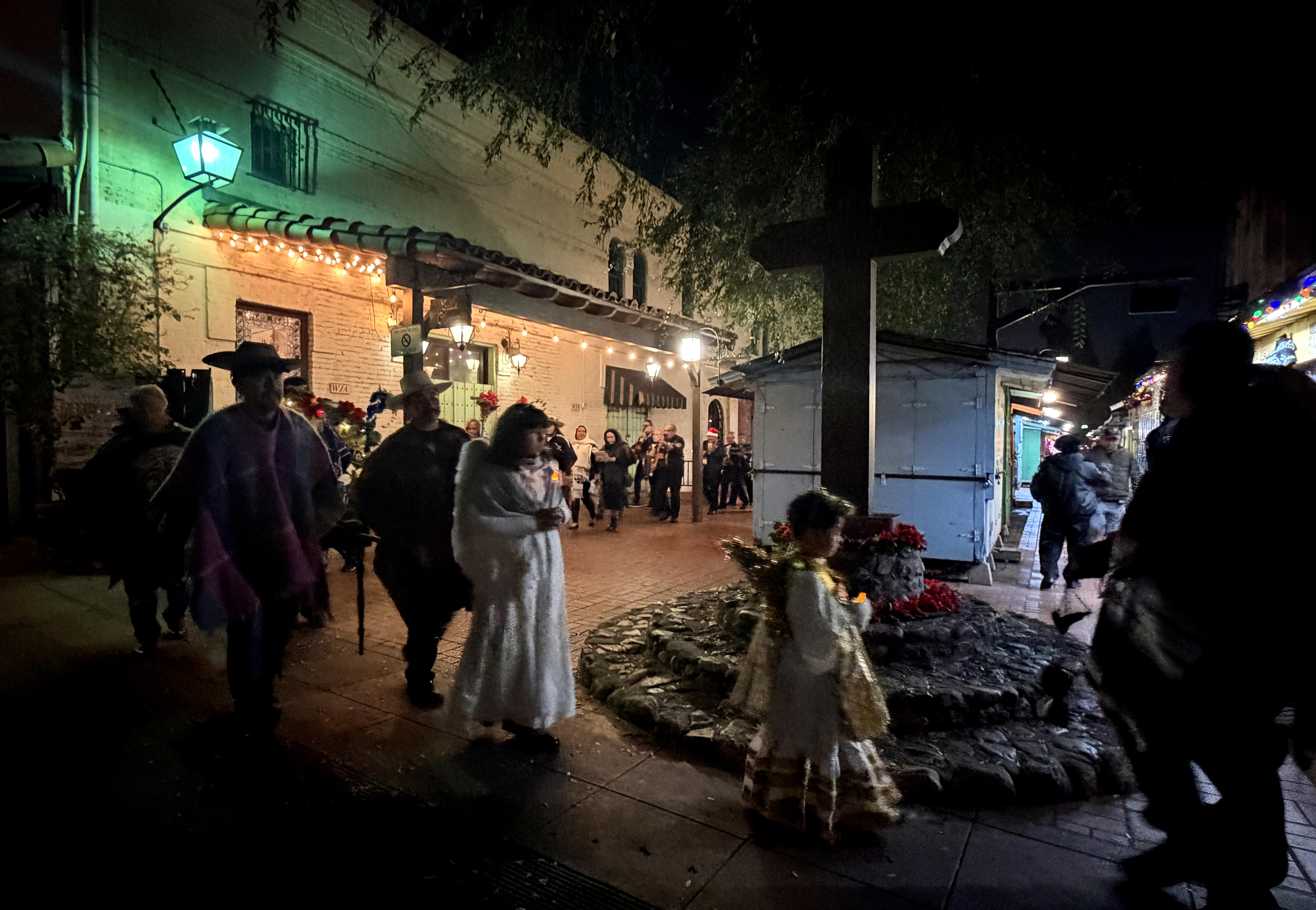 Las Posadas, reenacting the journey of Mary and Joseph to...