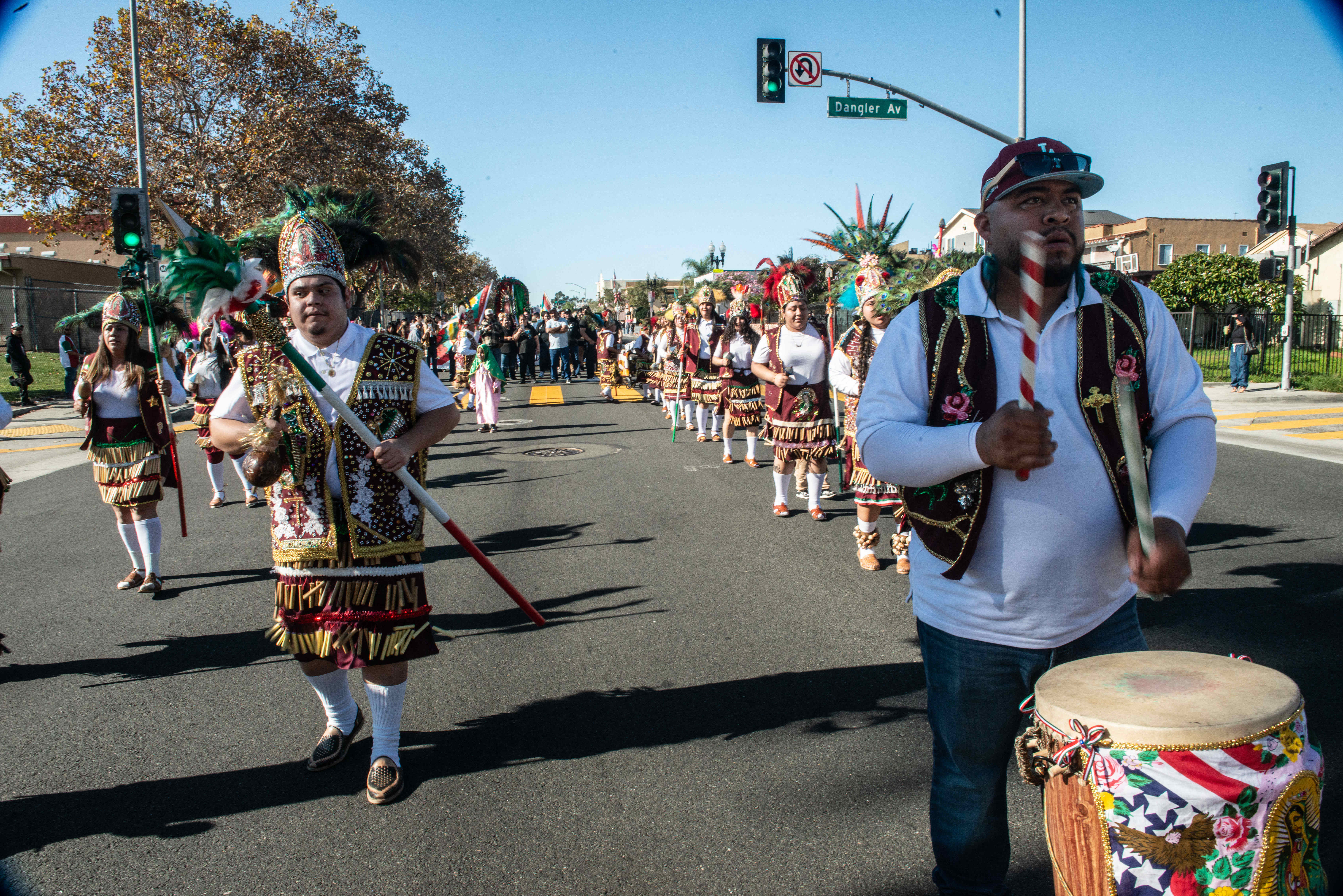Members of the Danza St. Michaels group perform along Cesar...