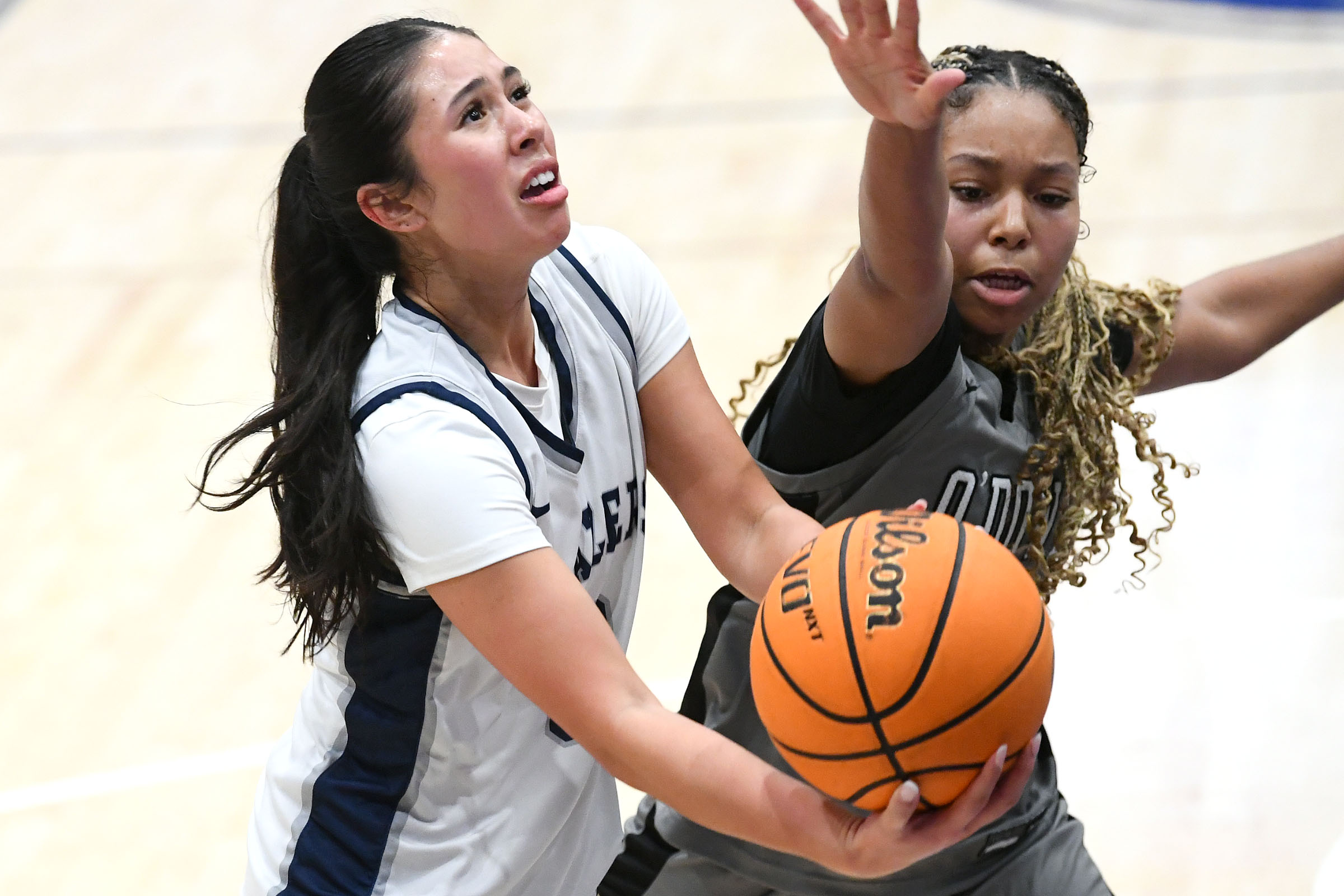 Sierra Canyonâs Jordyn Malek (3) drives to the hoop while...