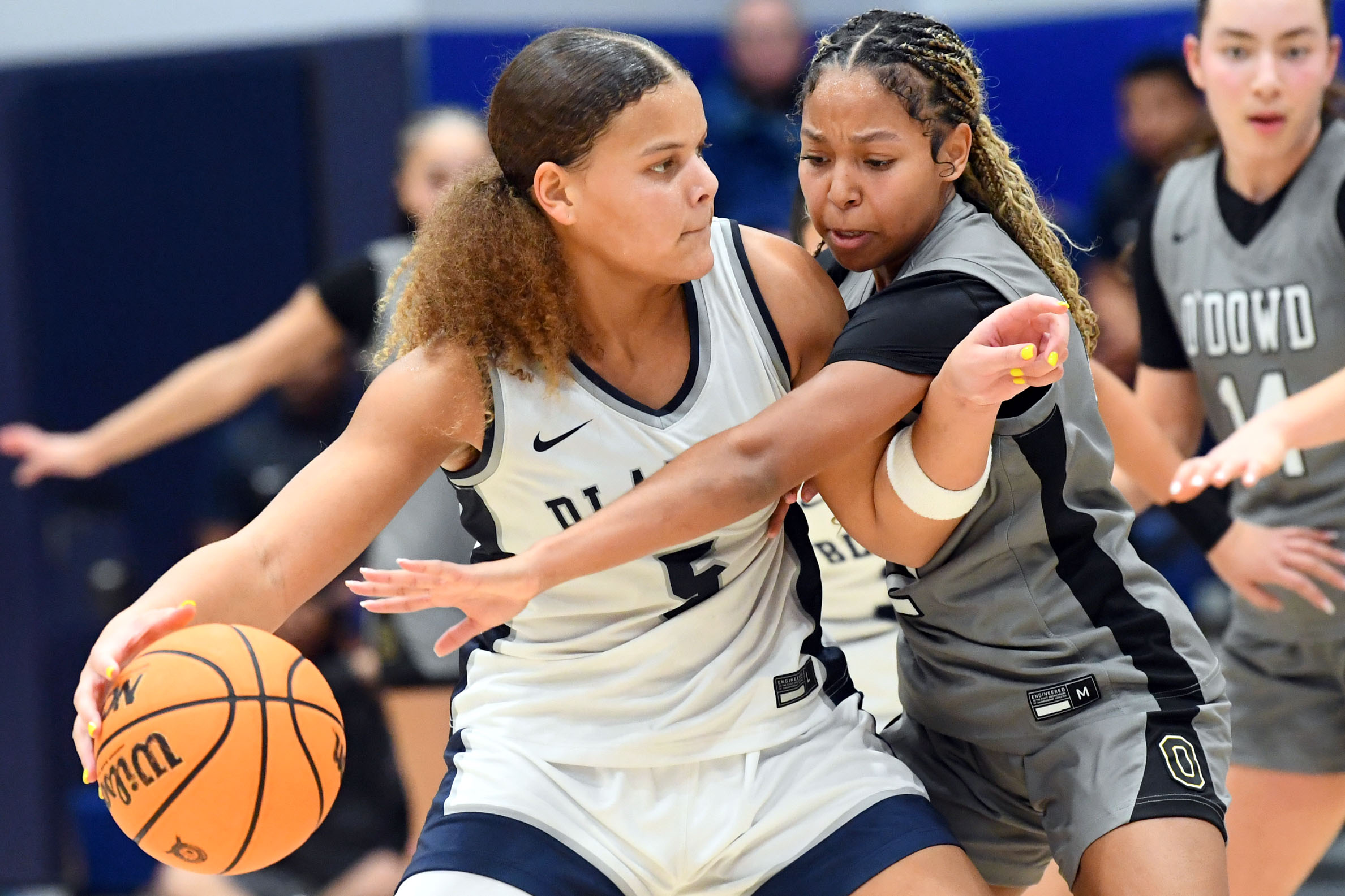 Bishop O’Dowdâs Jayla Stokes (2) defends Sierra Canyonâs Jerzy Robinson...