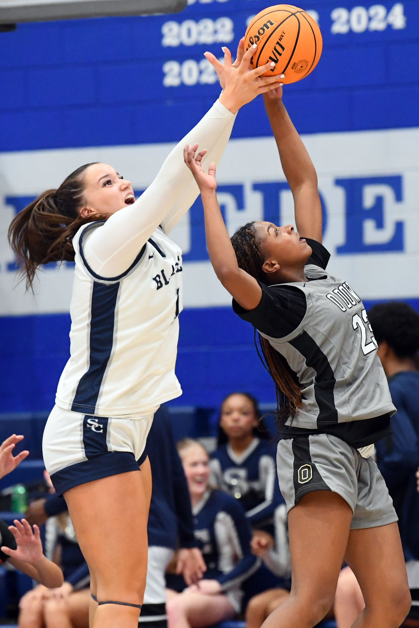 Sierra Canyonâs Emilia Krstevski (1) grabs a rebound over Bishop...