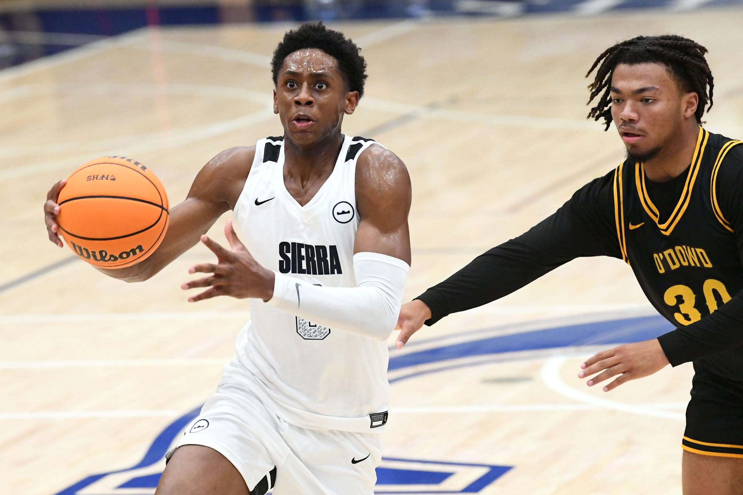 Sierra Canyonâs Brandon McCoy (0) gets by Bishop O’Dowdâs Carson...