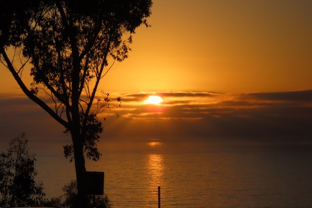 The sun sets July 31, as seen from the new UC San Diego Brian & Nancy Malk Sunset Overlook. (Janet Legaspi)