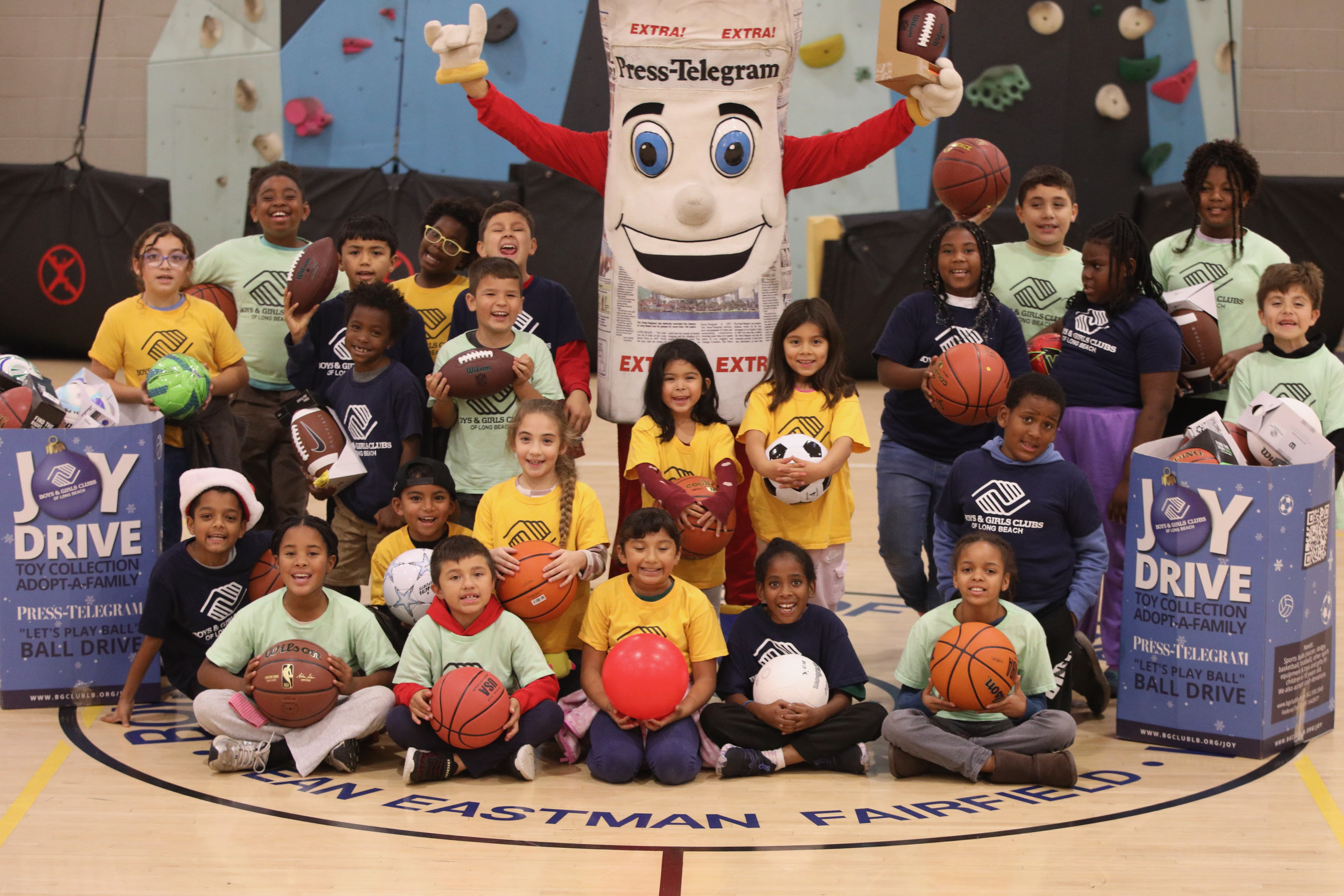 Long Beach Boys & Girls Club members are joined by...