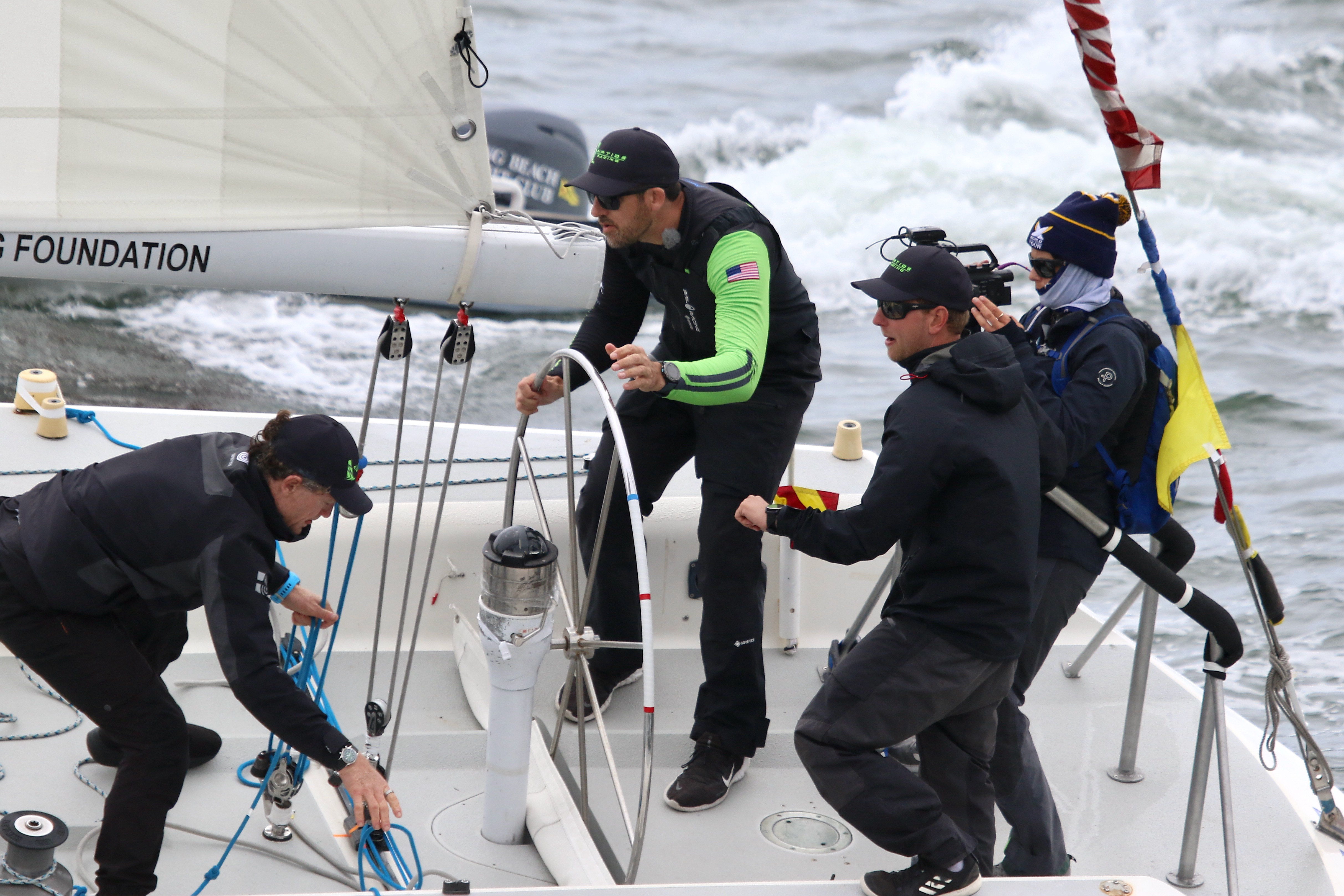 Two-time defending champion Chris Poole mans the wheel for his...