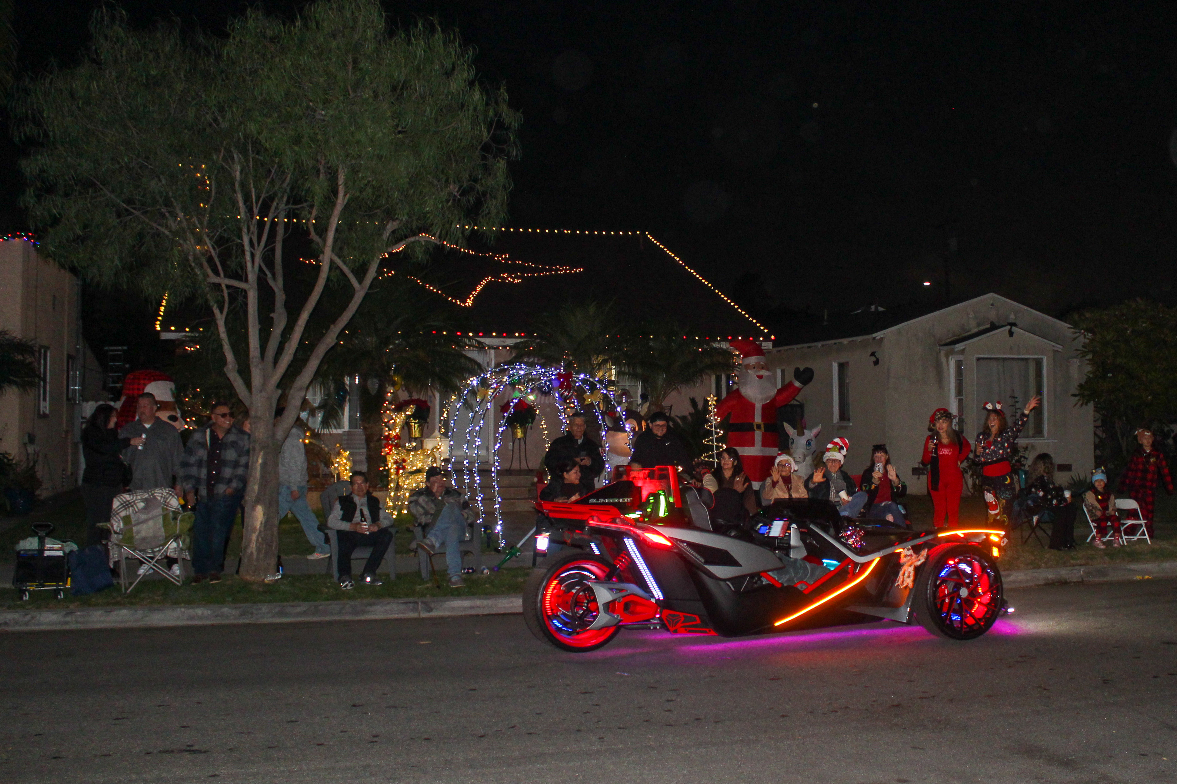 Several decorated three-wheeled vehicles made their way down Daisy Avenue...