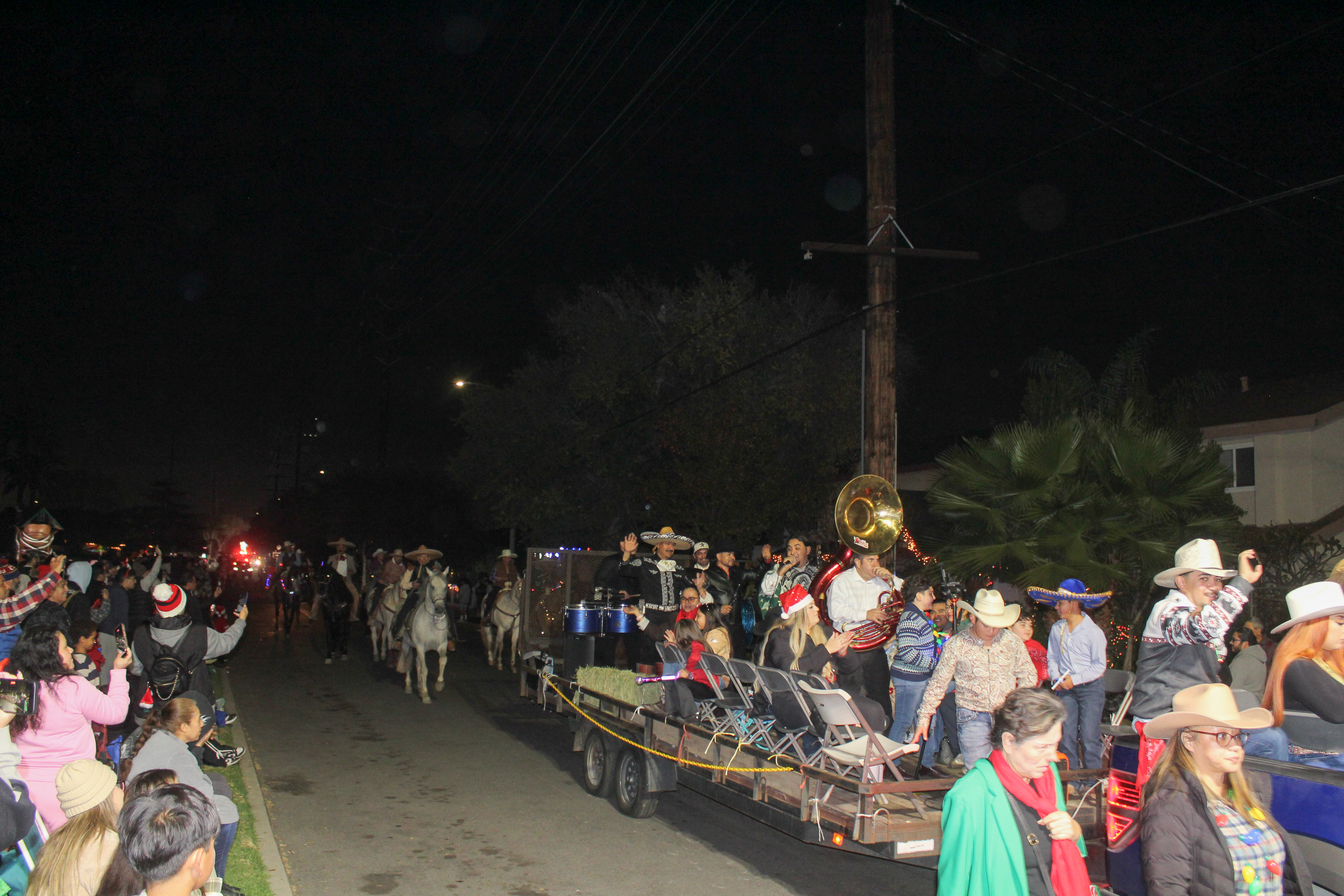 The crowd cheered as dancing horses walked the parade route...