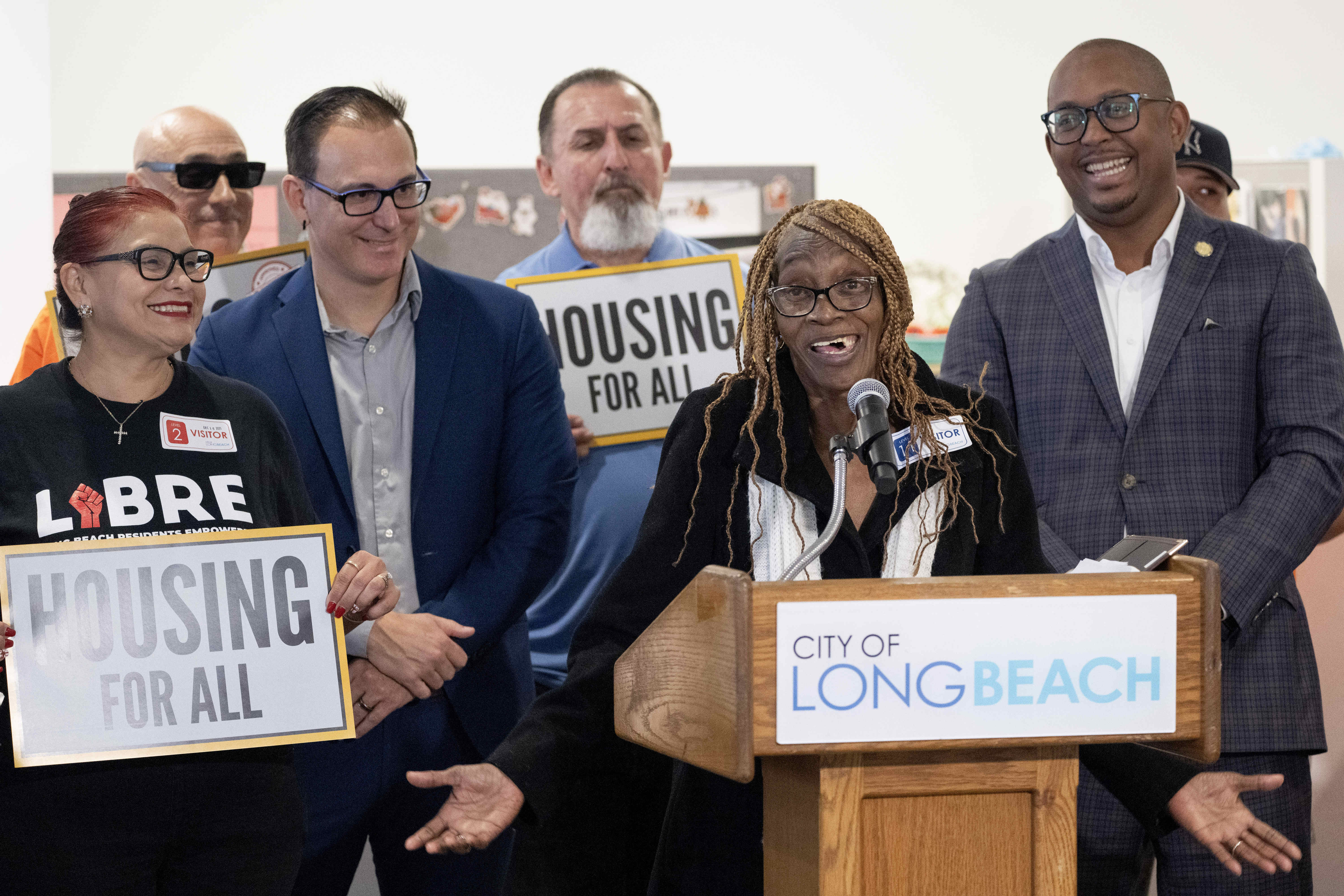 Resident of Heritage Gardens Cheryl Neal speaks during a press...
