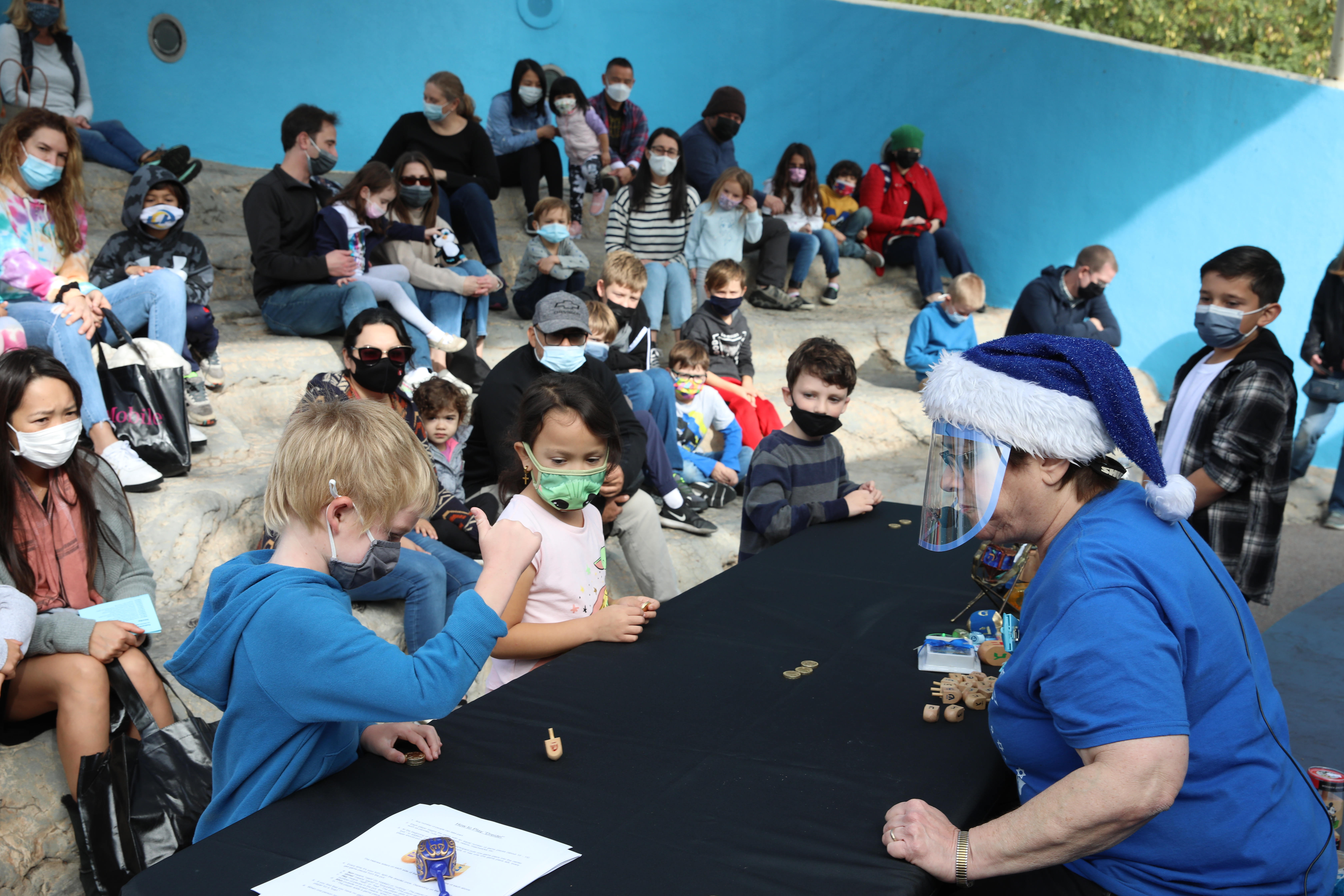 Maureen Lawrence of the Jewish Community Center teaches youngsters how...