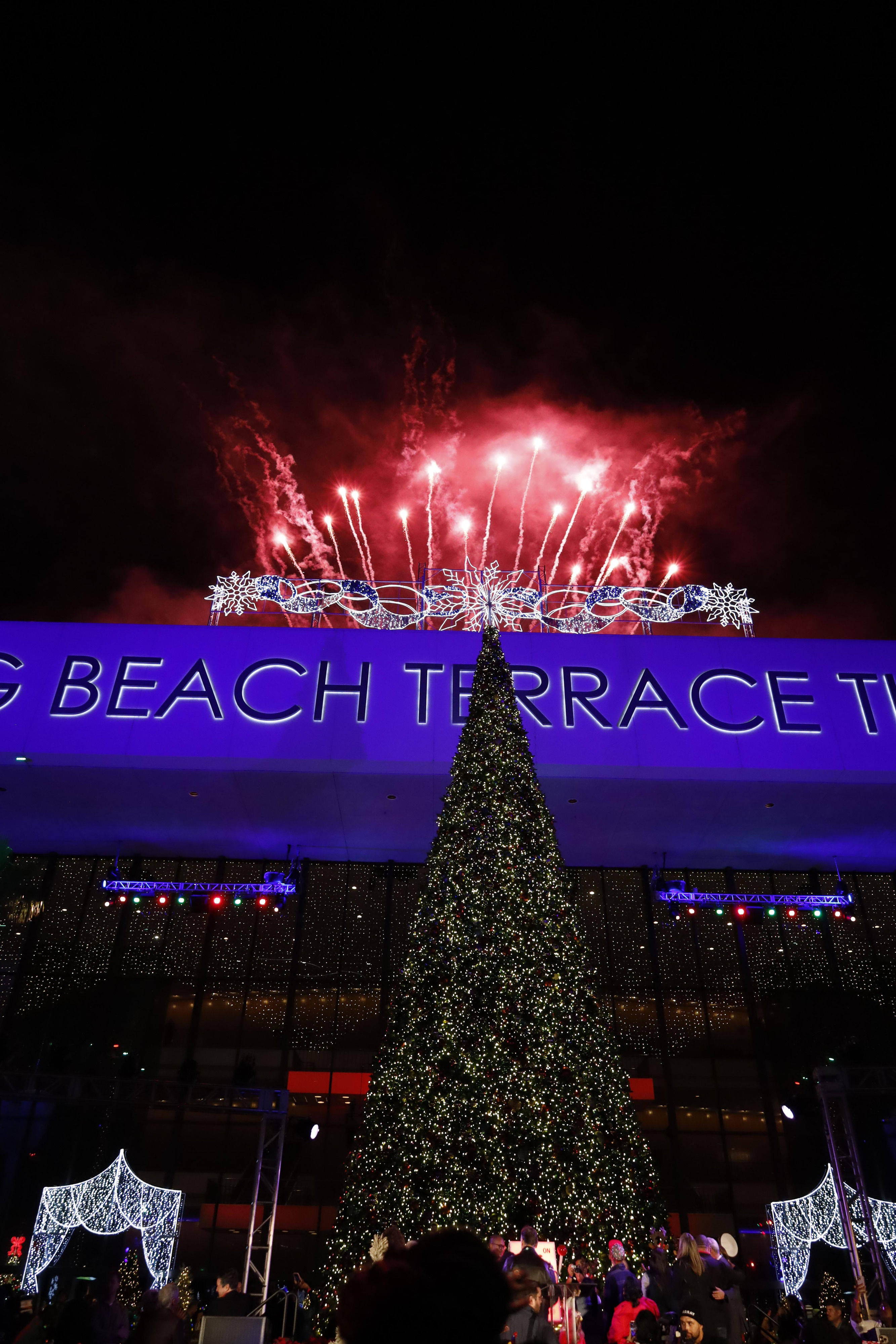 As soon as the Christmas tree lights turn, music and...