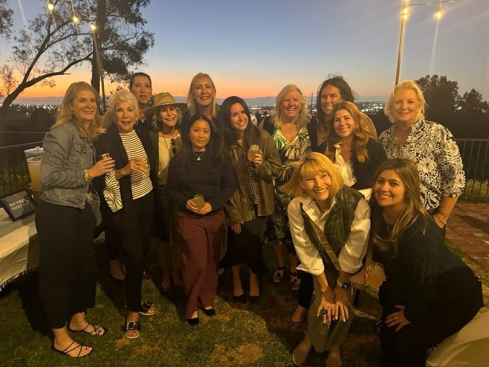 Members of the Magnolia Blooms, the auxiliary group of the...