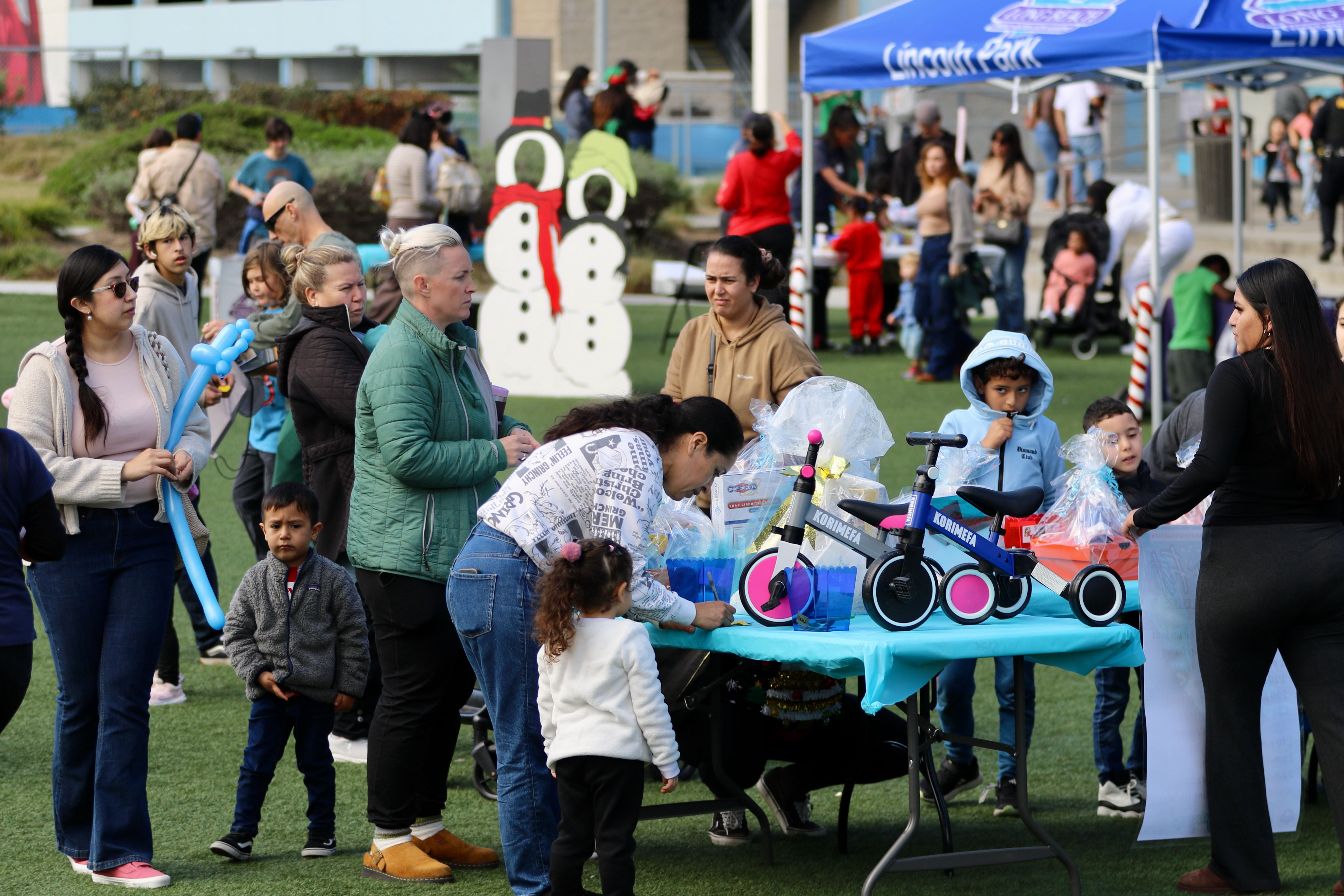 Families gather at Winter Fest on Saturday, Dec. 20, 2025,...