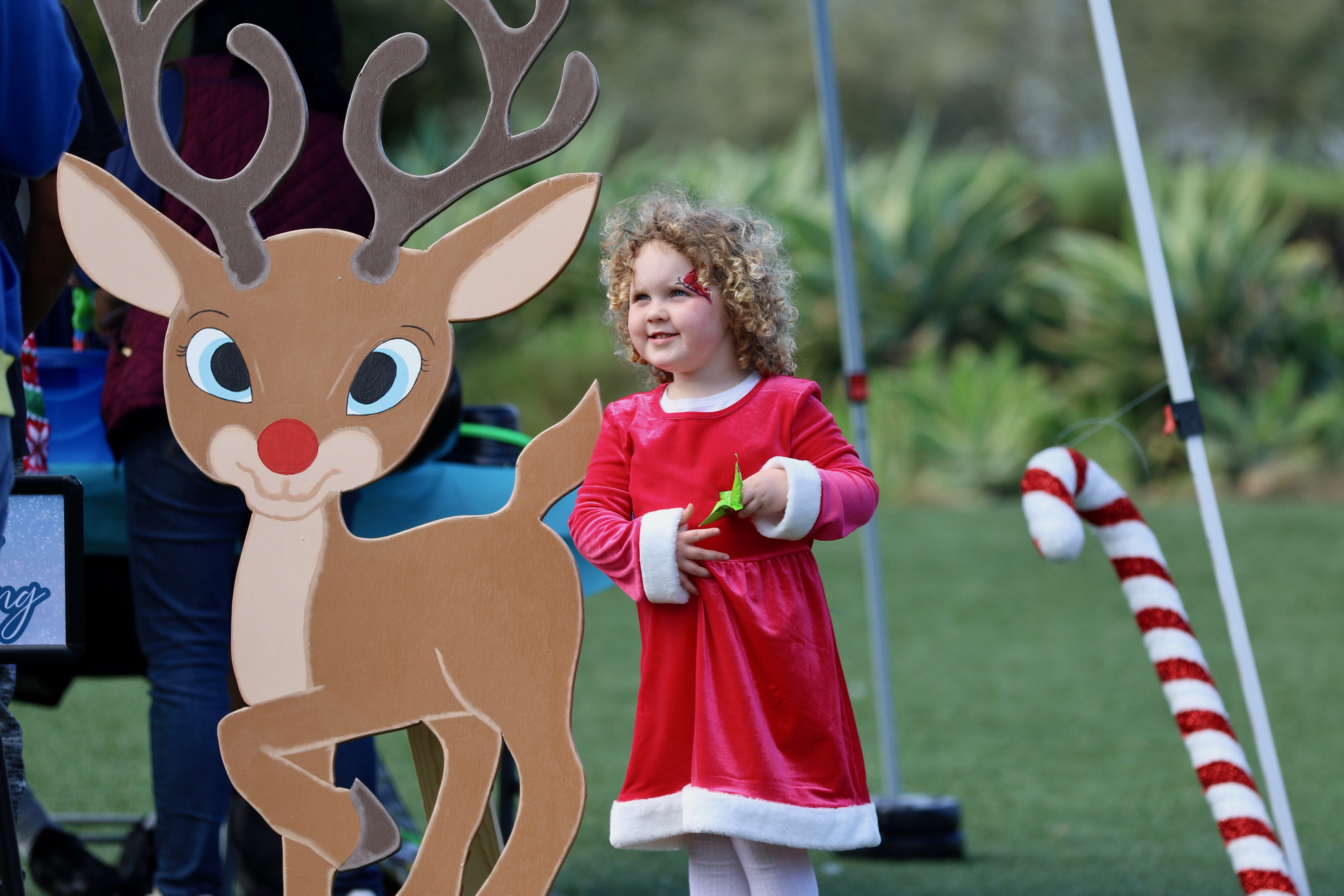 A young reveler celebrates the holiday season at Winter Fest...