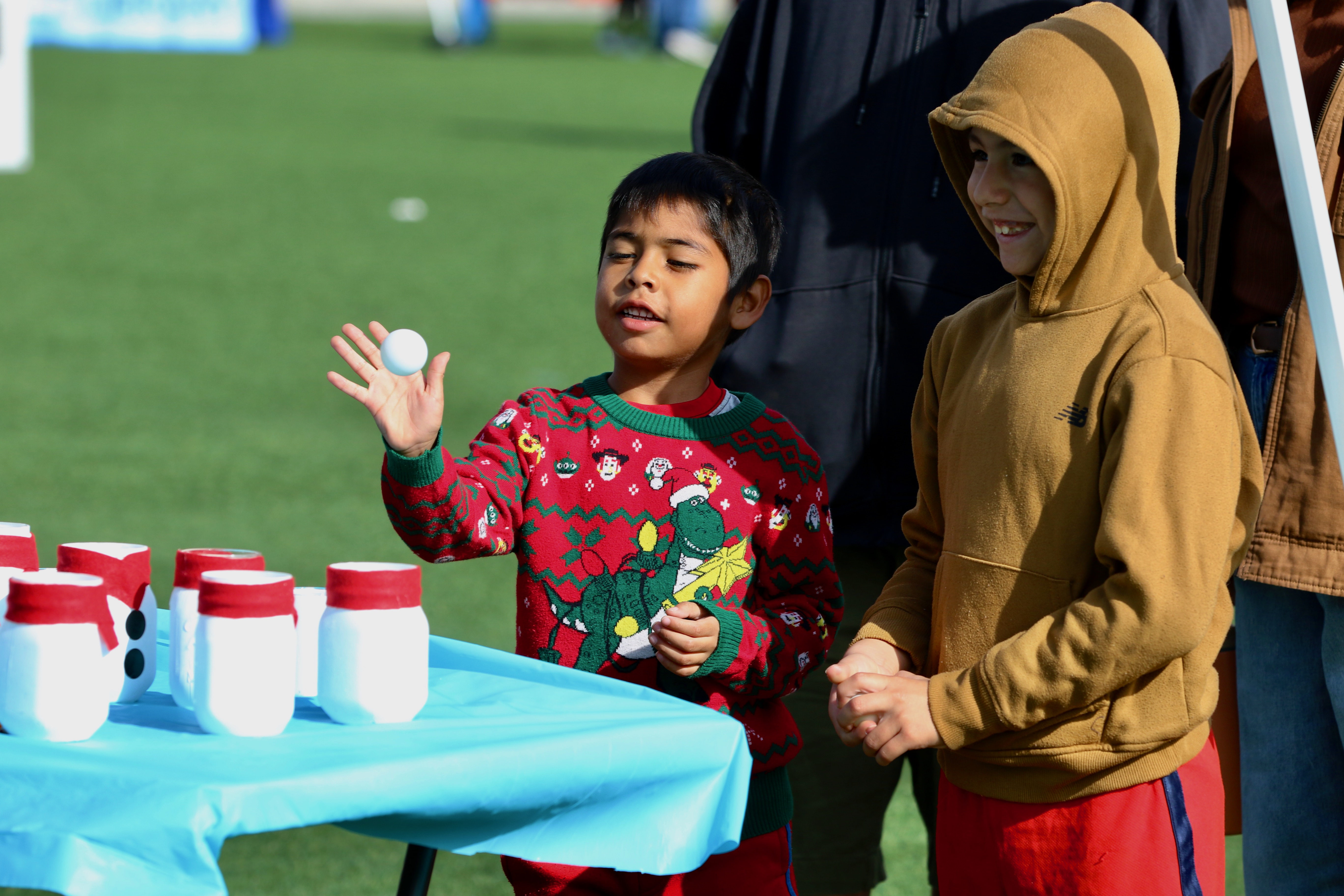 Pedro Almaraz, 6, left, and his brother Emanuel, 8, play...