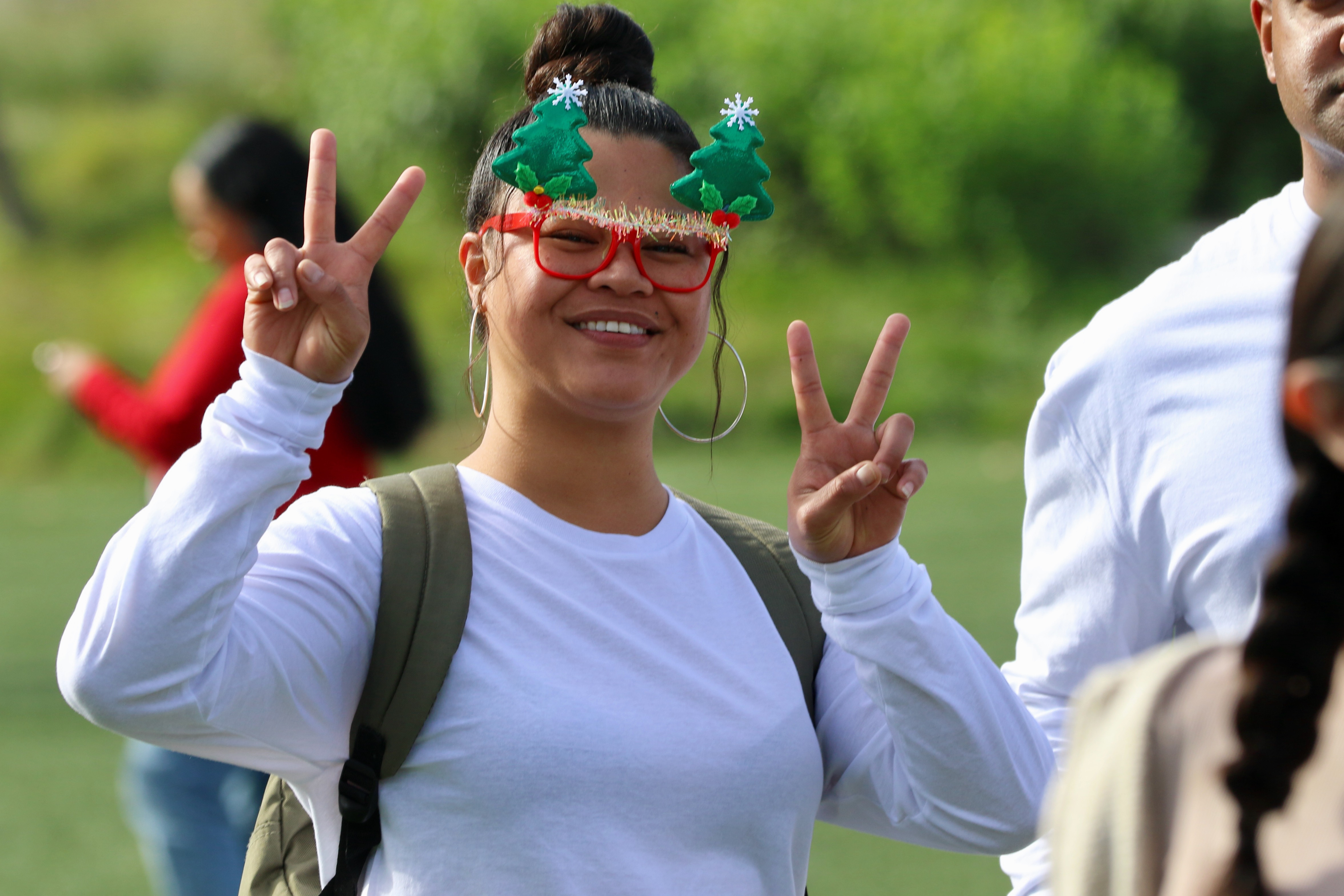 A reveler celebrates the holiday season at Winter Fest on...