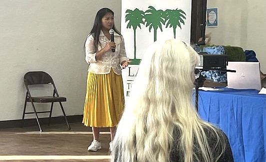 La Jolla Town Council President Mary Soriano addresses the crowd at the council's July 10 meeting. (Noah Lyons)