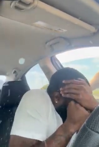 Nick Hoskins protects his face from shattered glass as a San Diego police officer smashes his window during a May 9, 2024, traffic stop in Southcrest. (Nick Hoskins via McKenzie Scott)