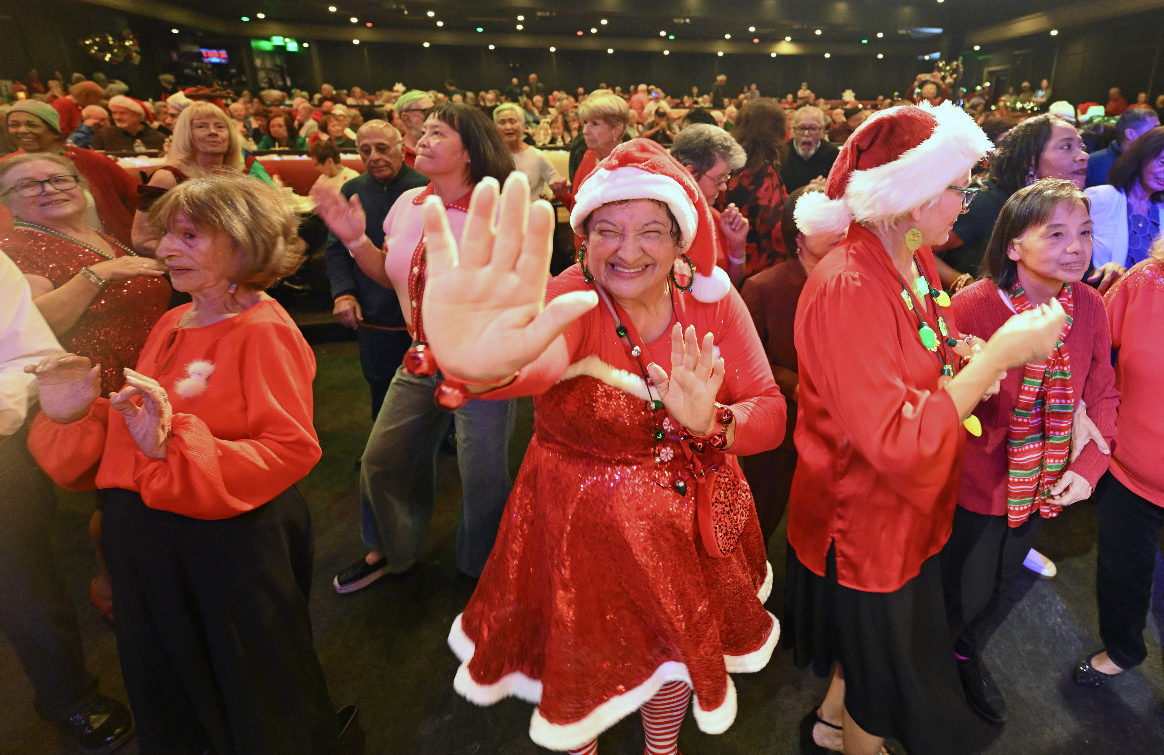 Mary Morales dances during The Annual Brea Senior Center Christmas...