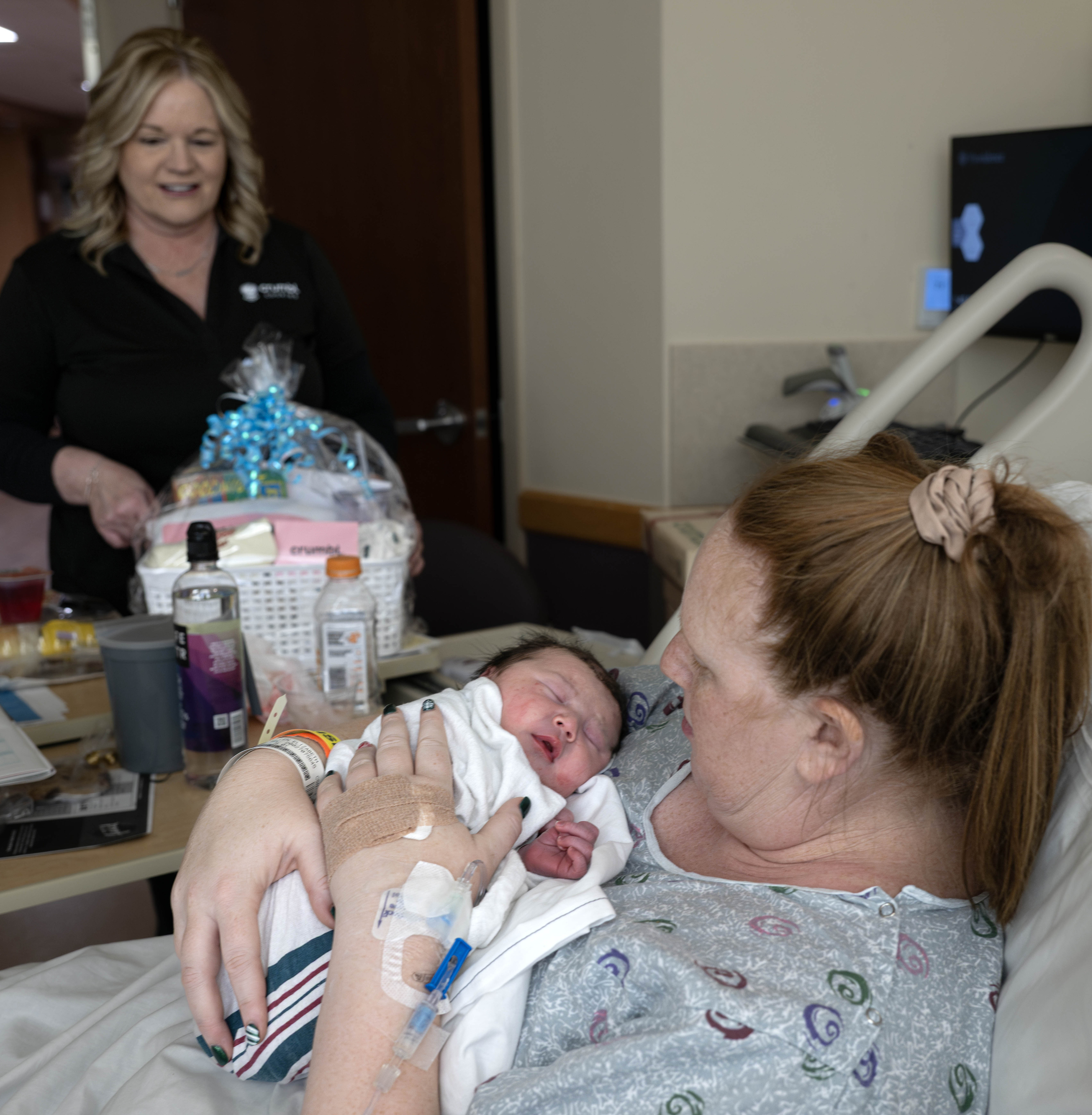 ColleenÂ Baro and her baby, Drew, are surprised by Michelle McKendry...