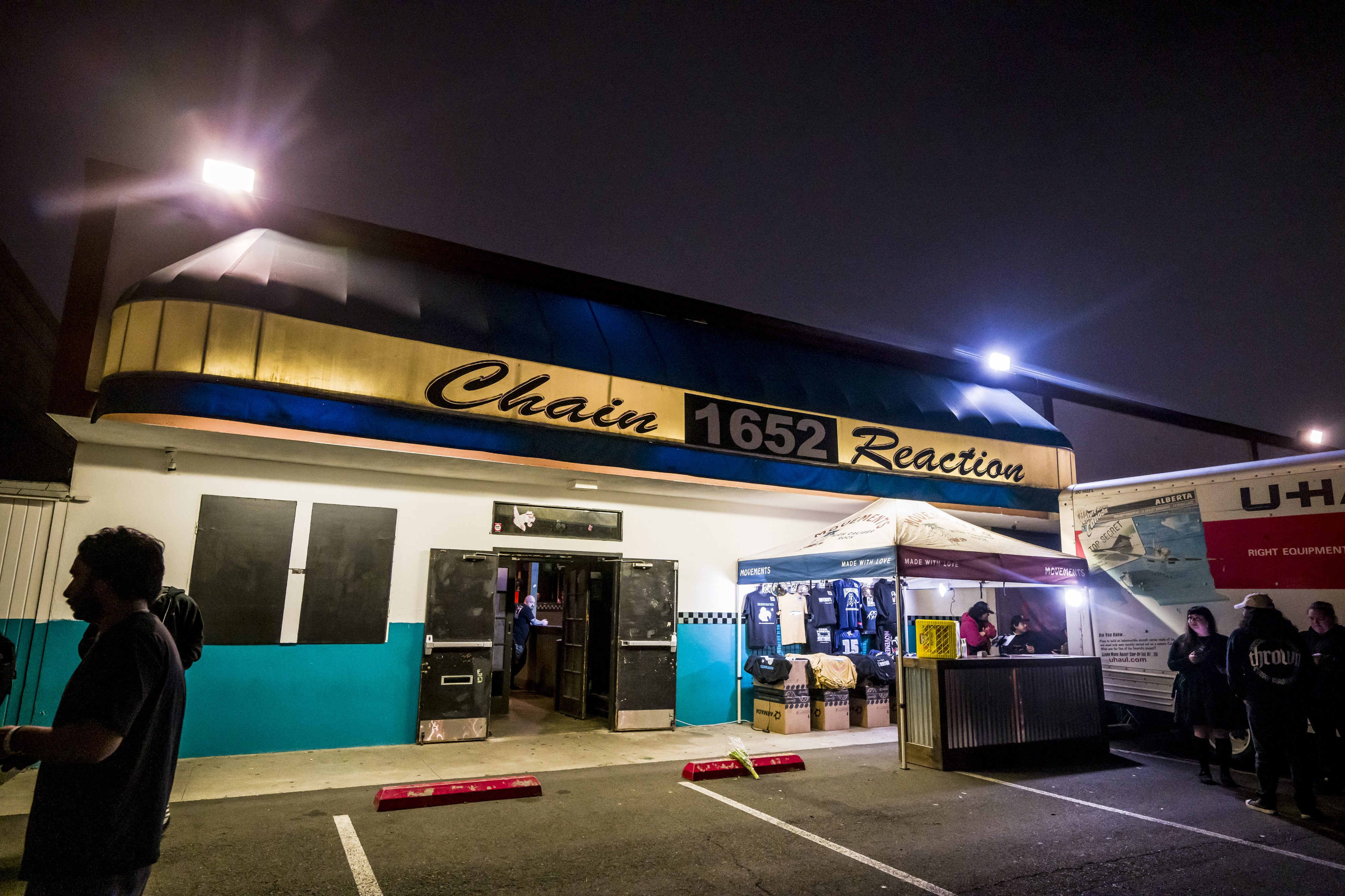 Alt-music fans wait in lines outside the Chain Reaction venue...