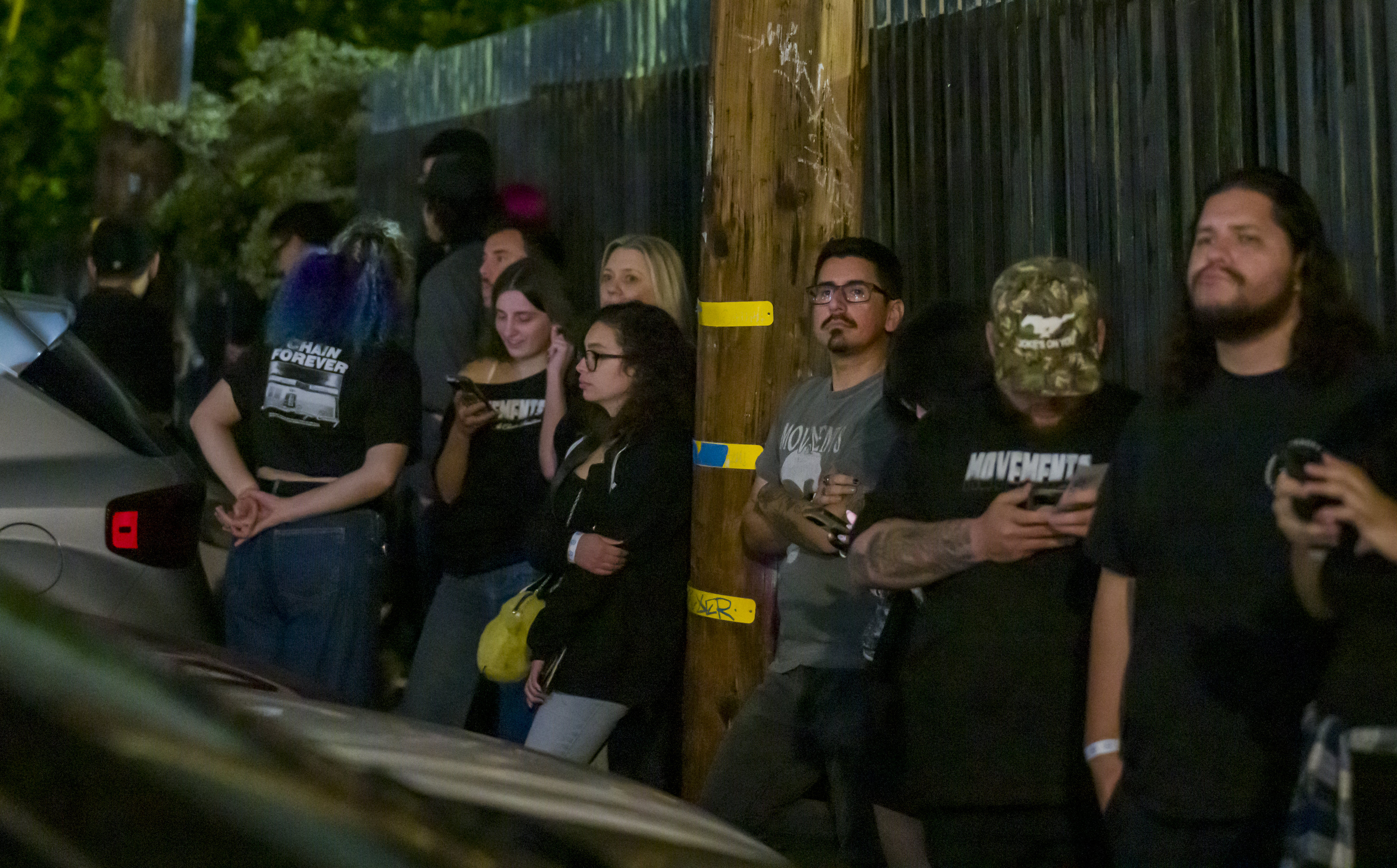 Alt-music fans wait in lines outside the Chain Reaction venue...