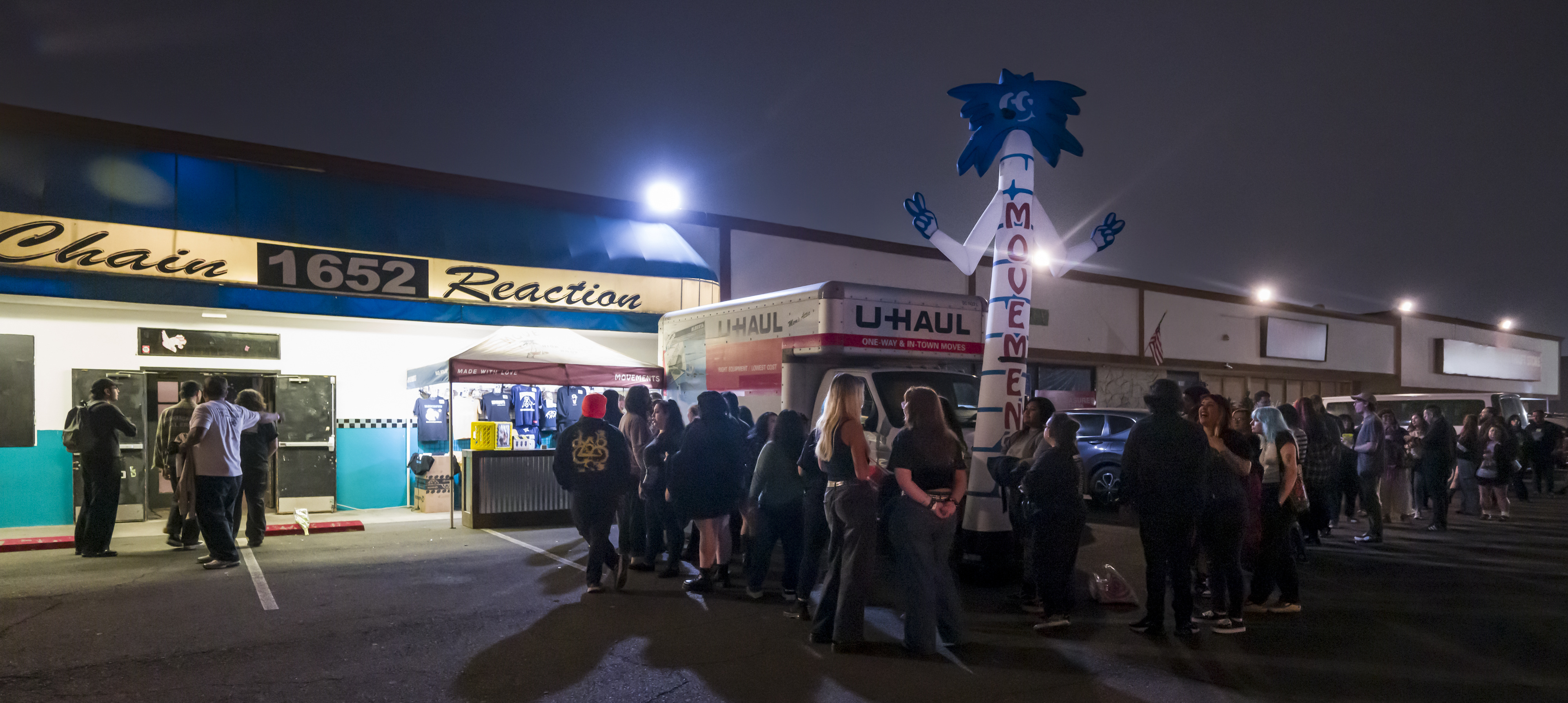 Alt-music fans wait in lines outside the Chain Reaction venue...