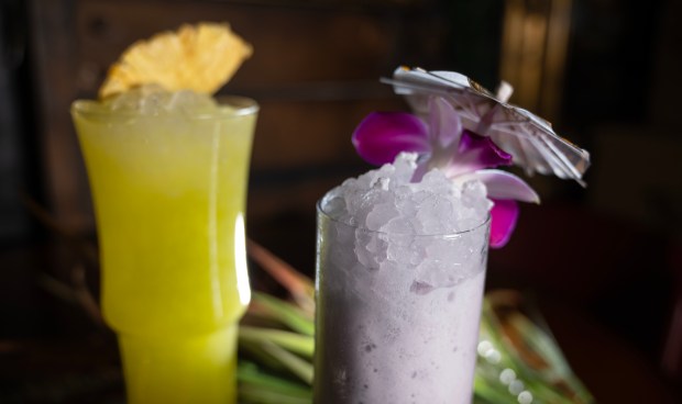 Strong Water Anaheim offers no alcohol drinks including Anana Rising, with pineapple, lemon, cinnamon and walnut bitters, left, and Tarobi Colada, with pineapple, lime, coconut, taro cream and cane on Monday, December 30, 2024. (Photo by Mindy Schauer, Orange County Register/SCNG)