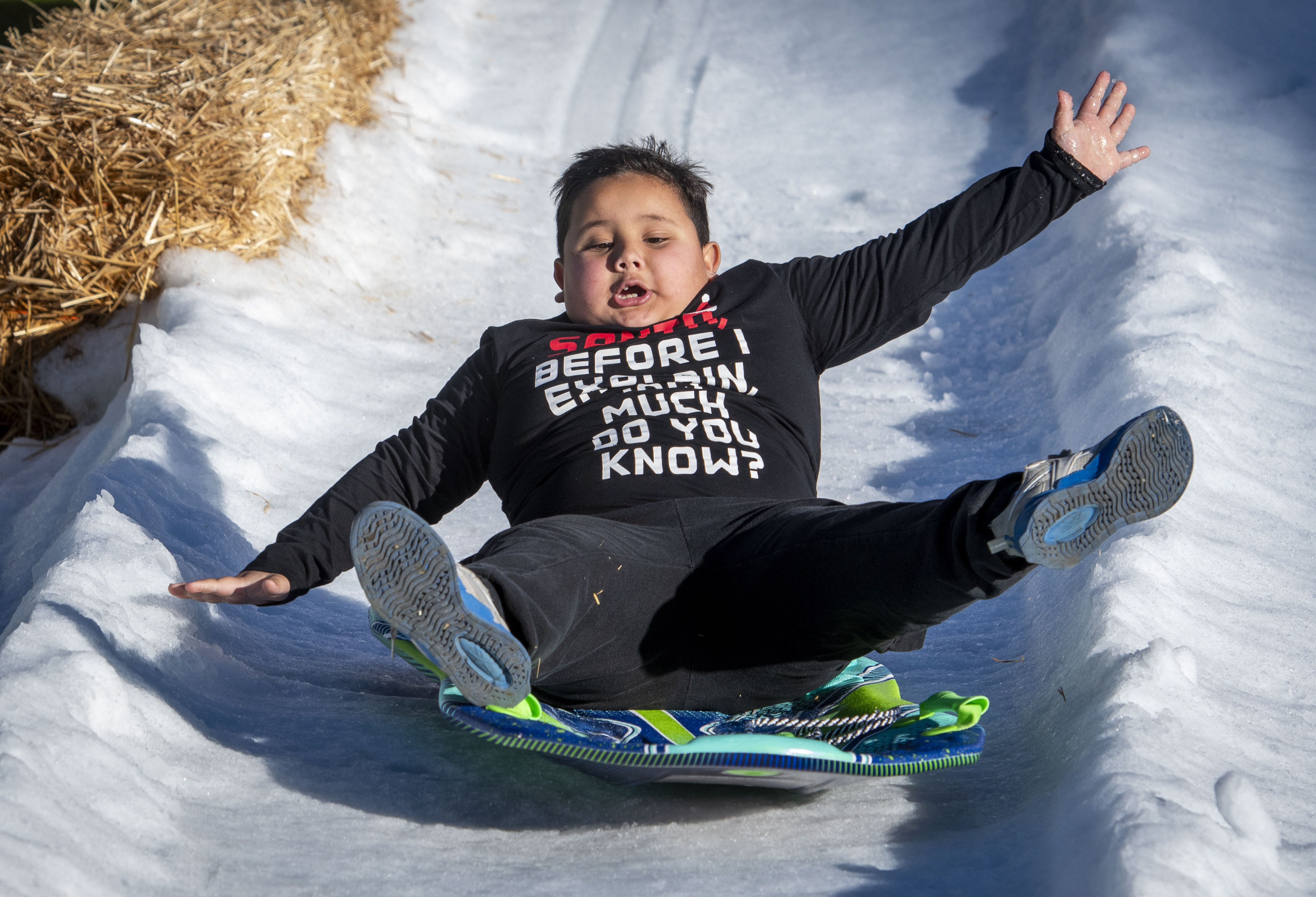 Theodore Peach, 7, comes flying down the slopes as one...